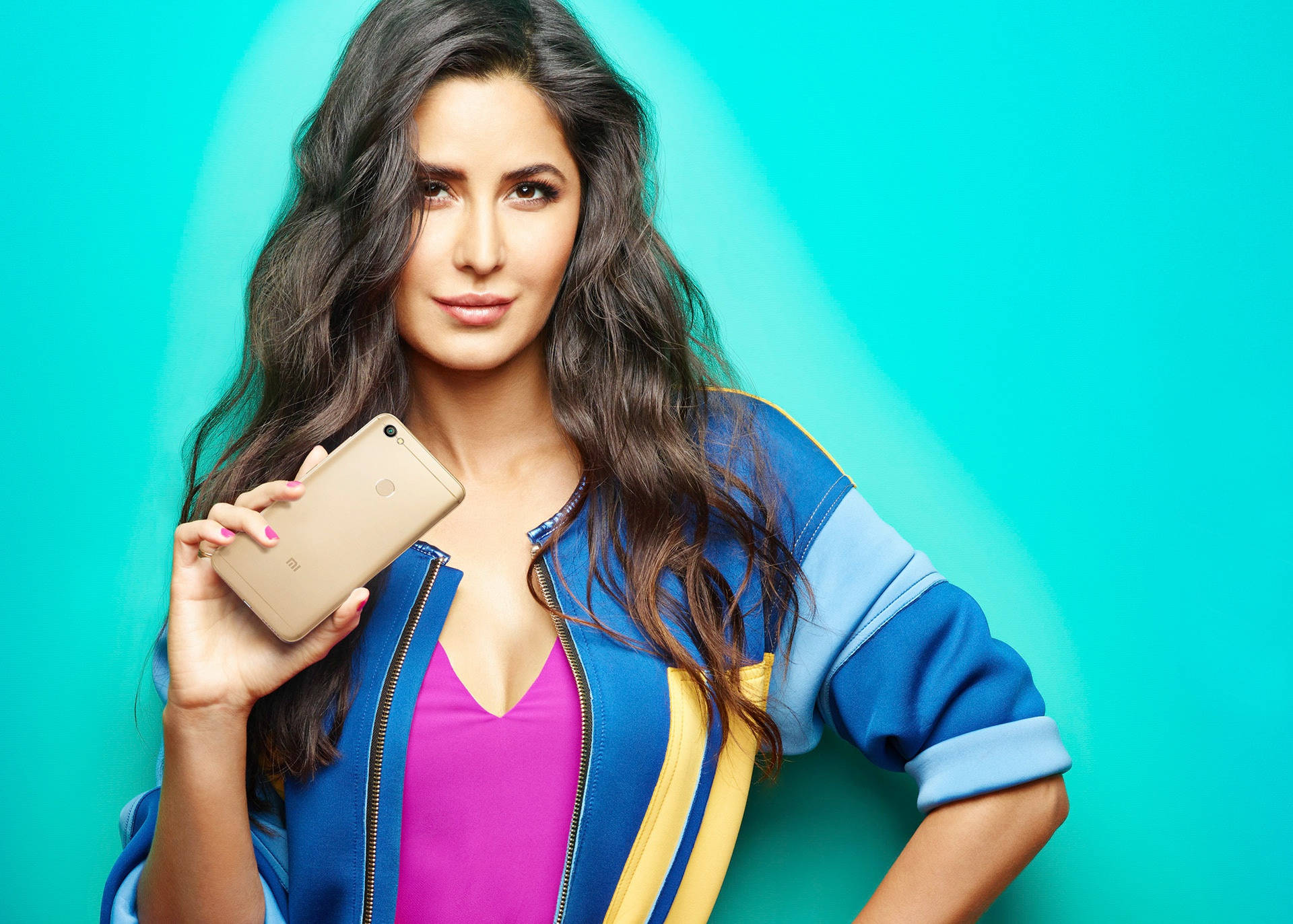 Katrina Kaif, gold smartphone, vibrant teal gradient background, Full HD Desktop Wallpaper