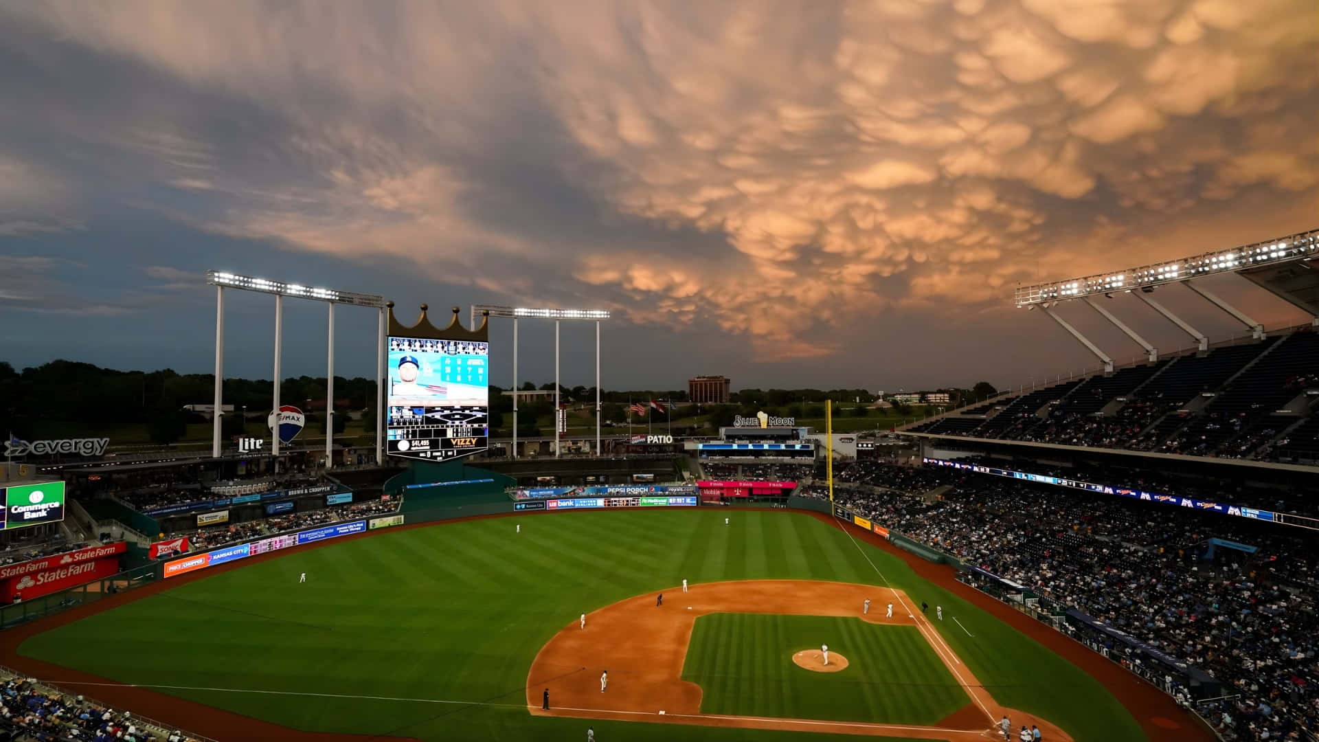 Kauffman Stadium, sunset view, dramatic textured orange and gray sky, Full HD Desktop Wallpaper
