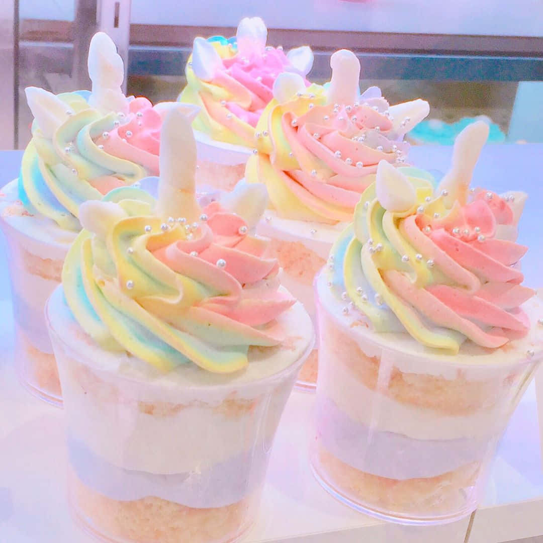 kawaii dessert, rainbow-swirled unicorn cupcakes, pastel frosting, SD Desktop Wallpaper
