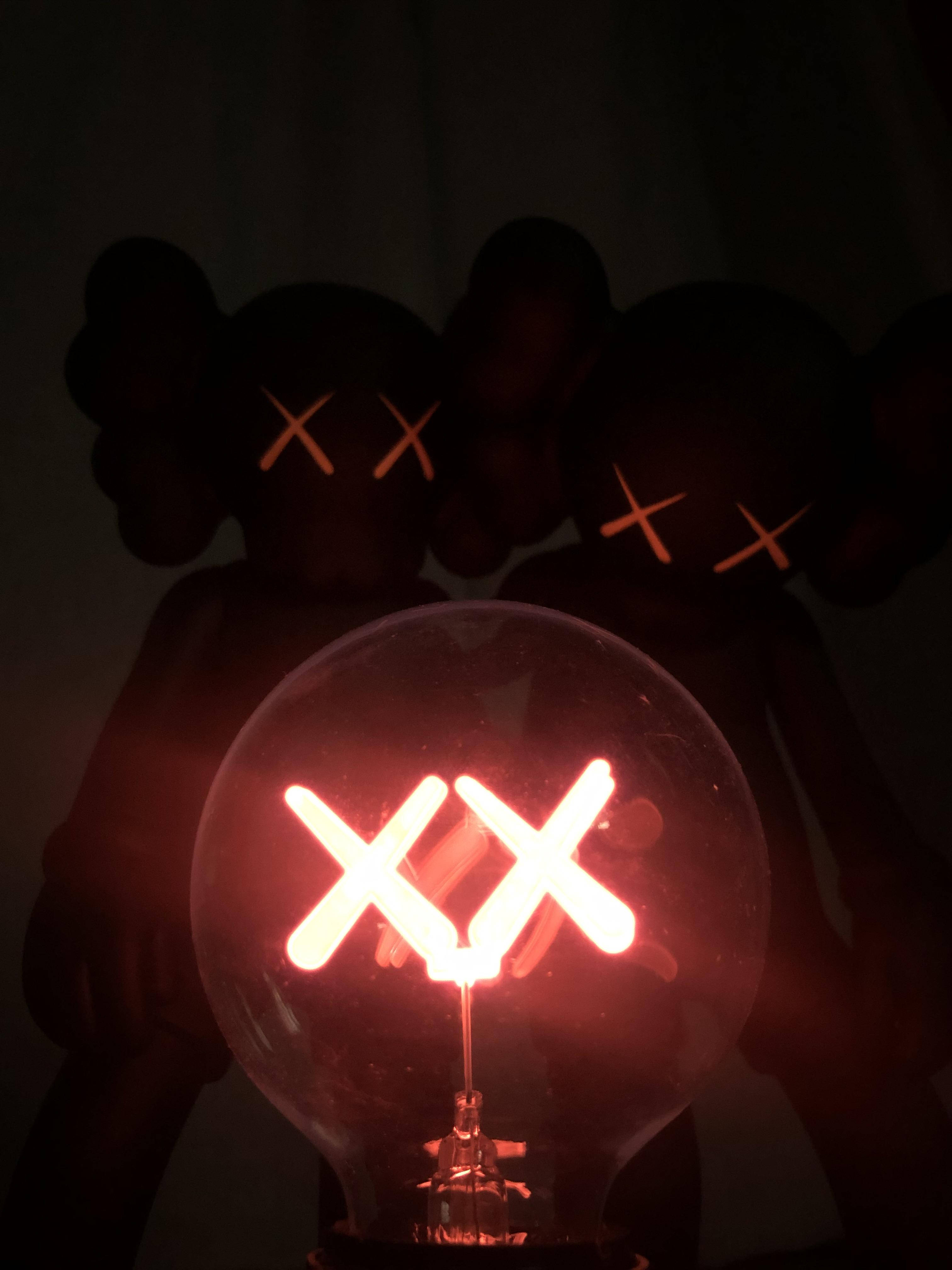 Kaws, red light bulb, X-shaped filament, 4K Phone Wallpaper
