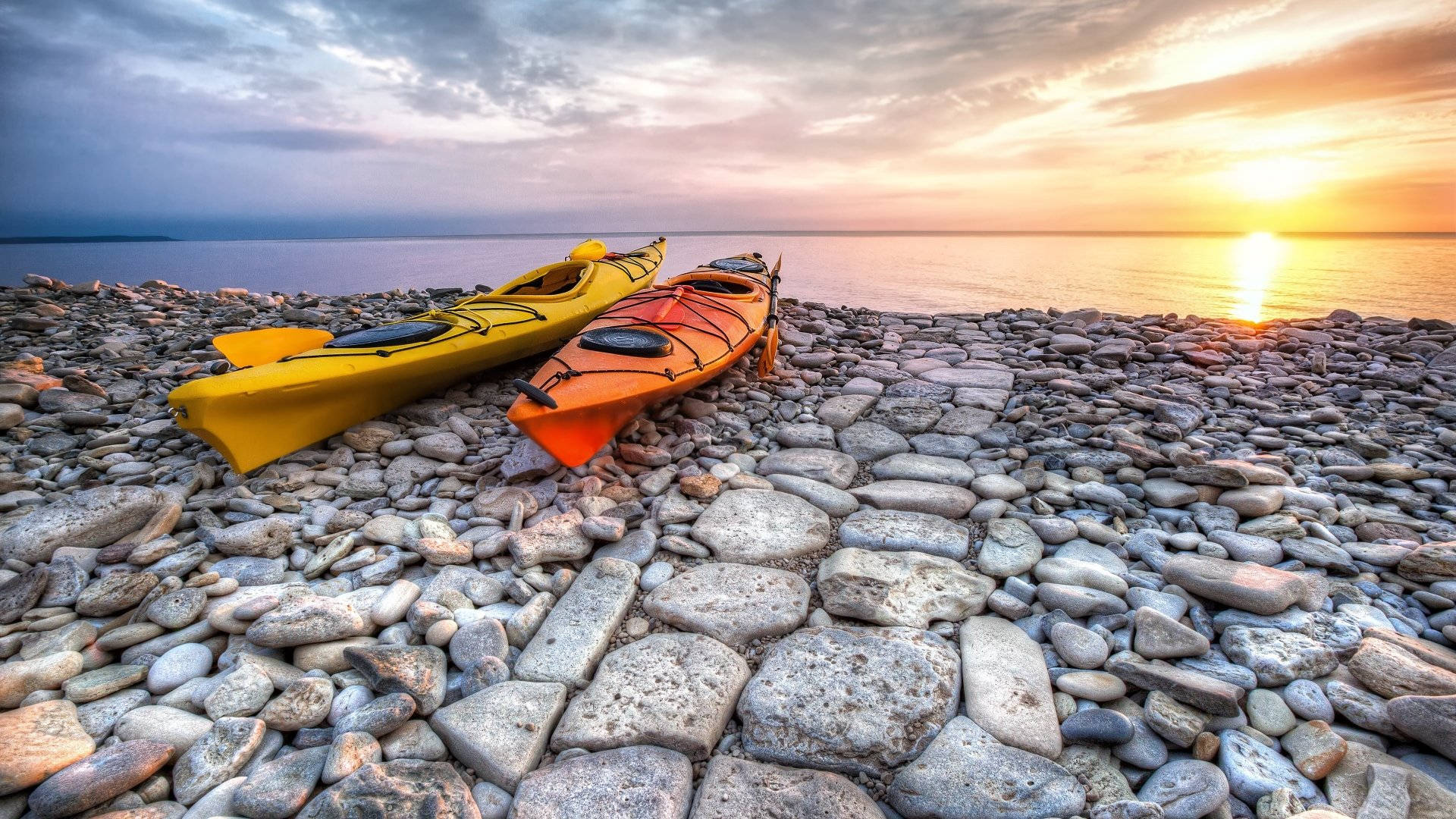 kayaking, rocky shoreline, sunlit pebble beach, Full HD Desktop Wallpaper