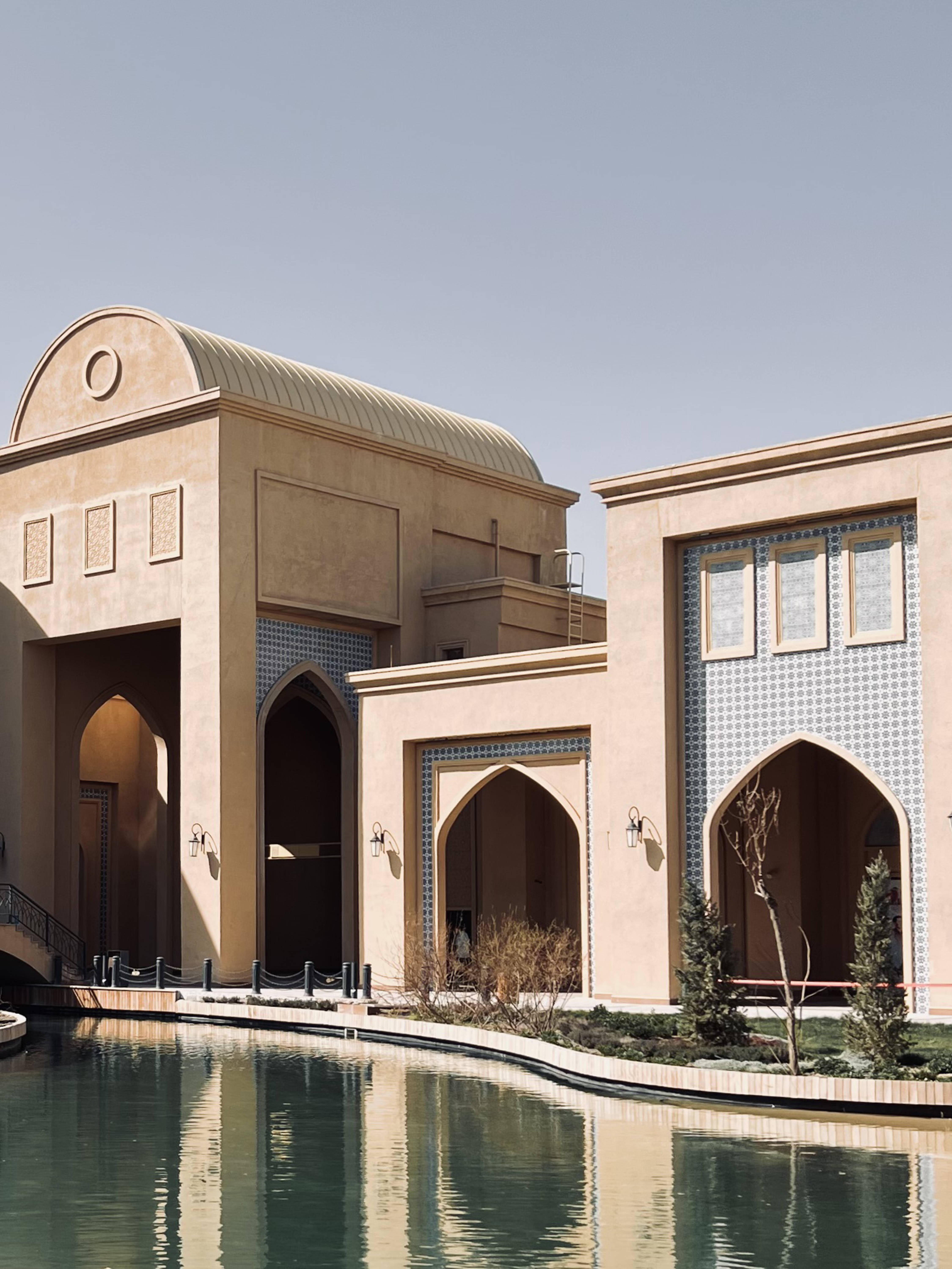 villa in kazakhstan, beige Islamic architecture, arched doorways, 5K Phone Wallpaper