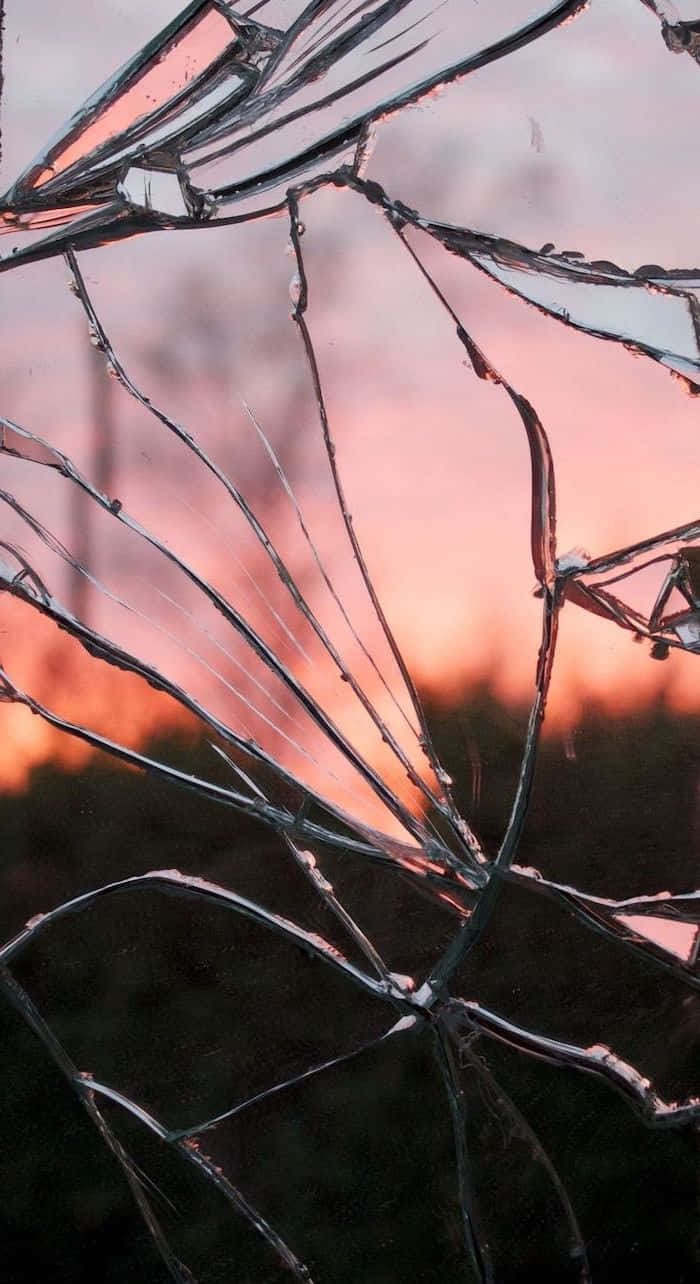Aesthetic Sunset iPhone, pink and orange sunset sky, shattered glass fragments, HD Phone Wallpaper