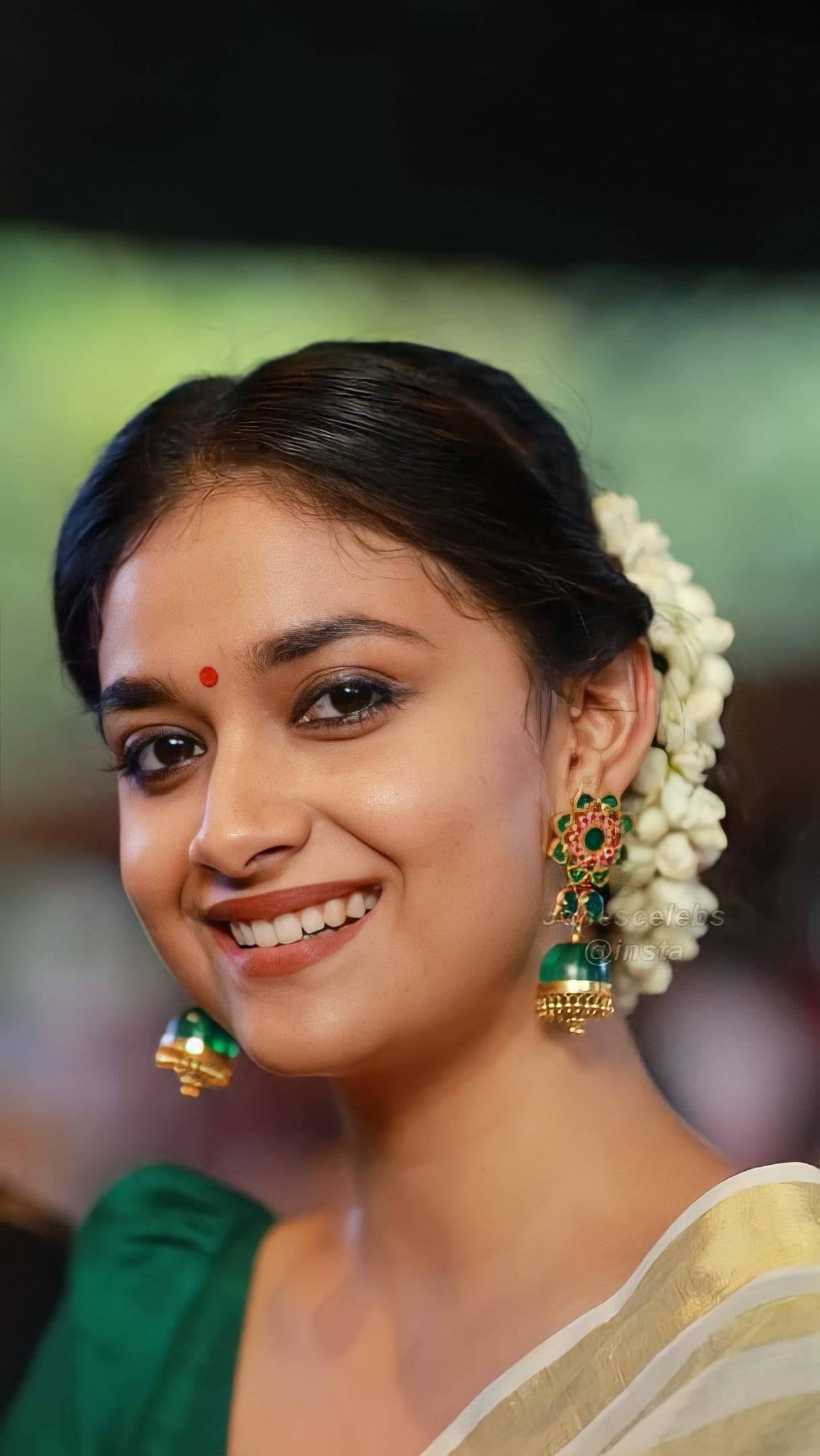 Keerthi Suresh, floral hairpiece, ornate green earrings, Full HD Phone Wallpaper