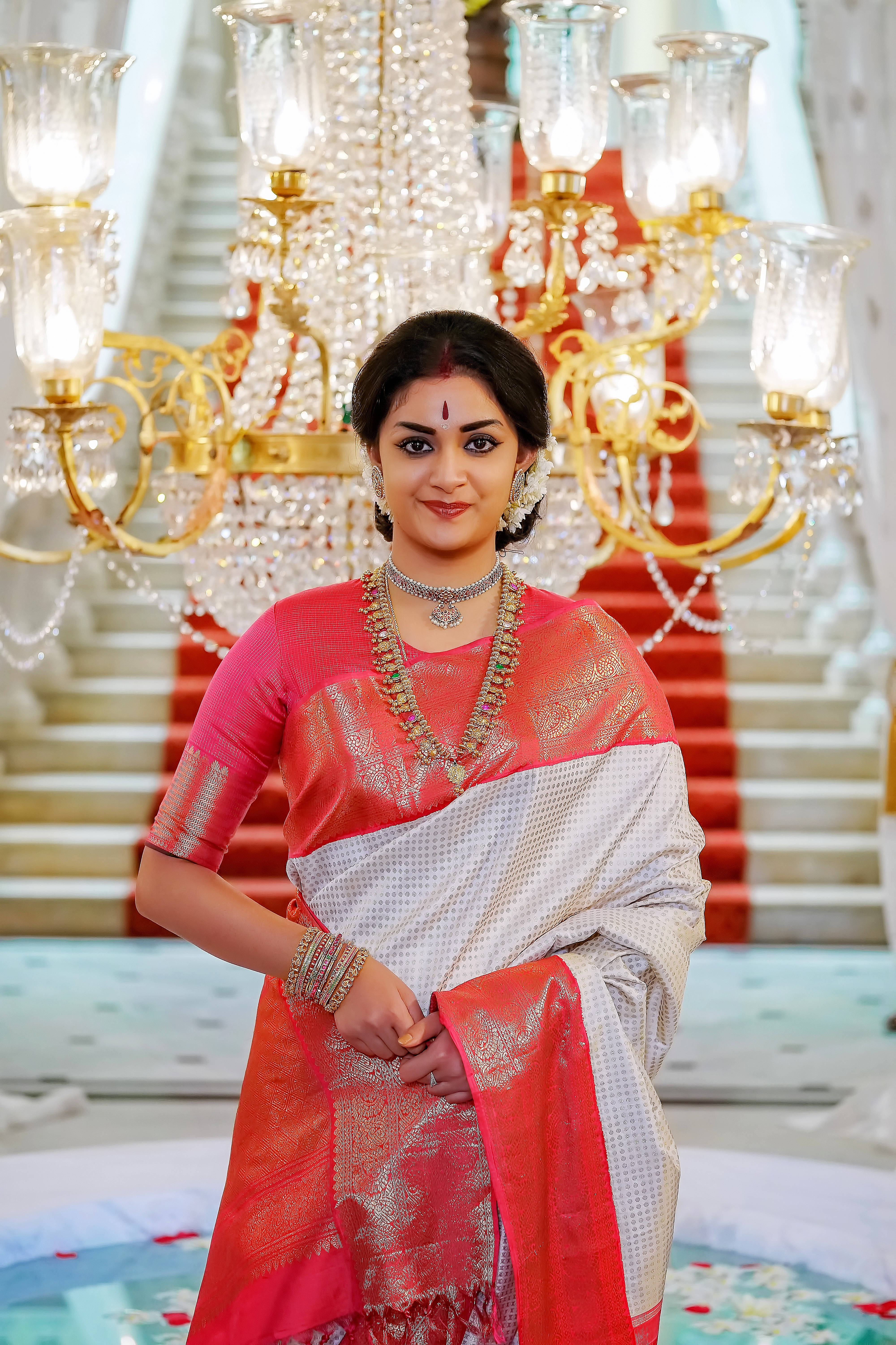 Keerthi Suresh, pink and silver saree, grand chandelier, 5K Phone Wallpaper
