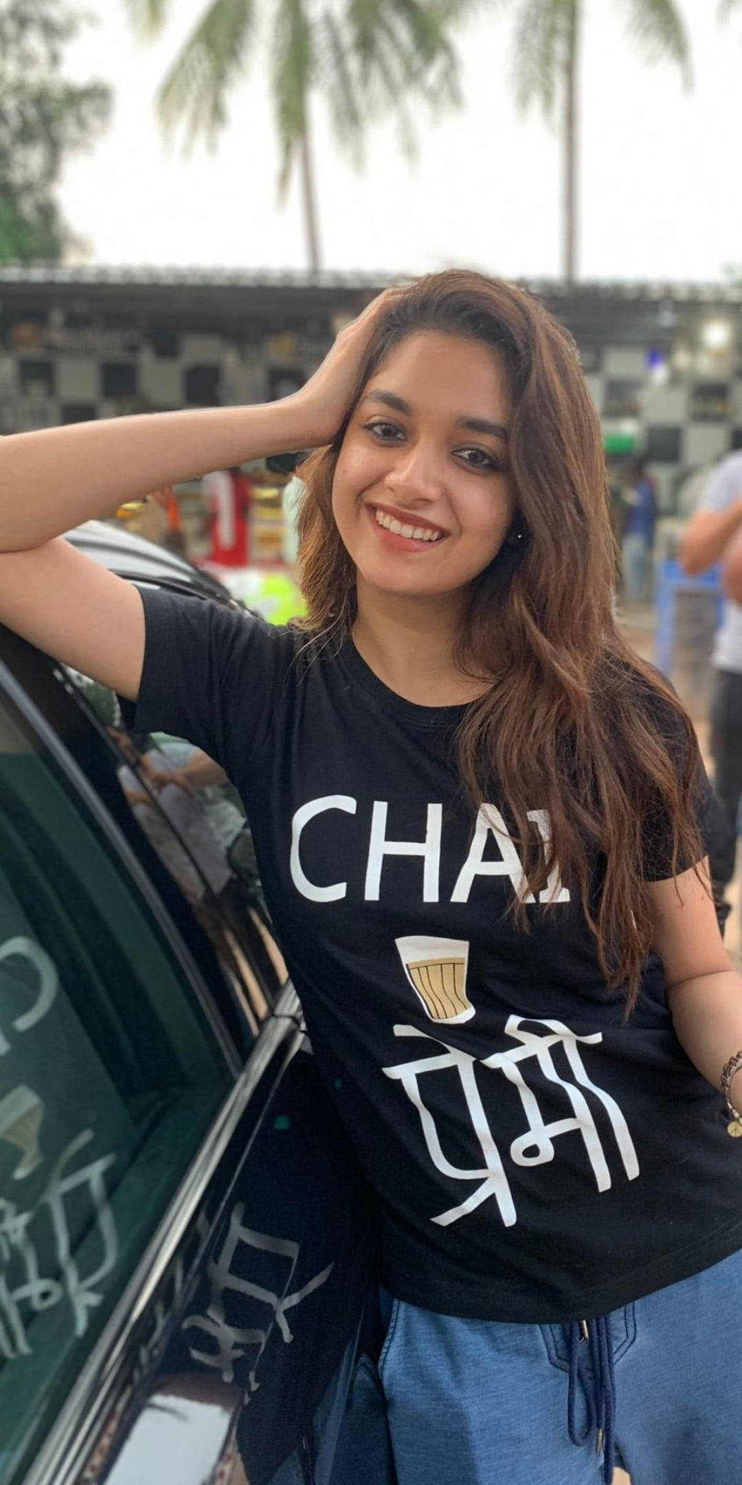Keerthi Suresh, black chai-themed t-shirt, car, Full HD Phone Wallpaper