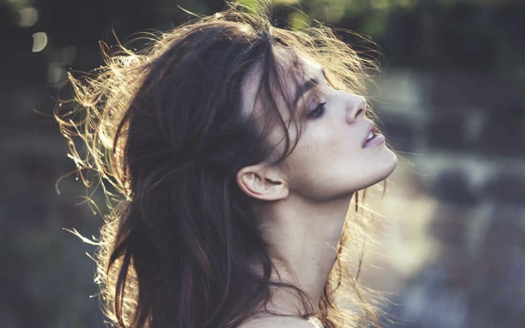 Keira Knightley, tousled dark hair, golden sunlight, SD Desktop Wallpaper