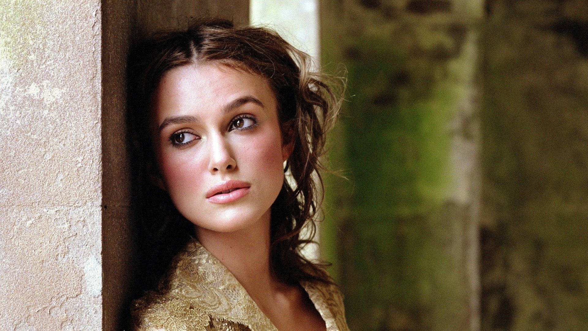 Keira Knightley, tousled brown hair, stone wall, Full HD Desktop Wallpaper