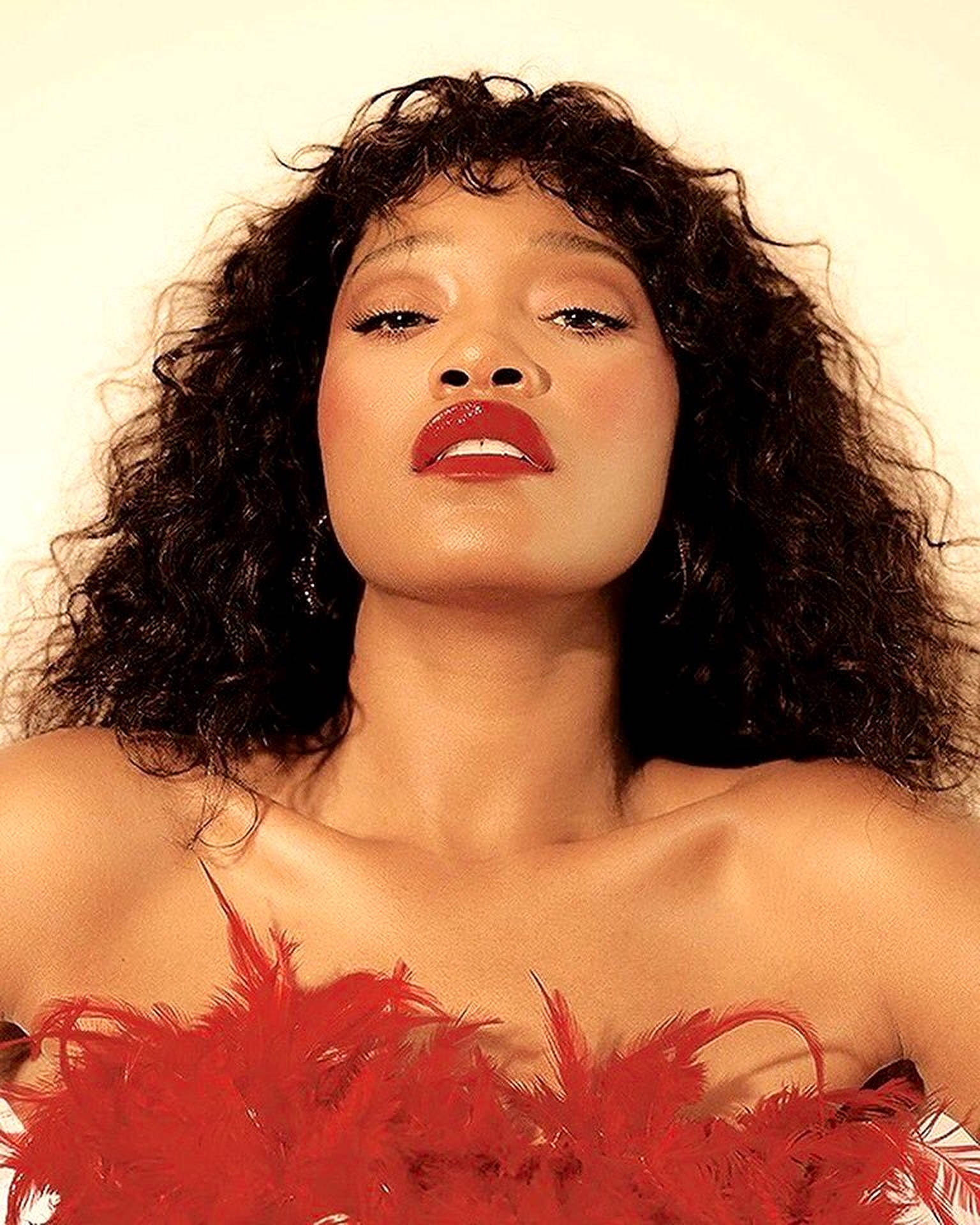 Keke Palmer, red feathered top, voluminous dark curls, Full HD Phone Wallpaper