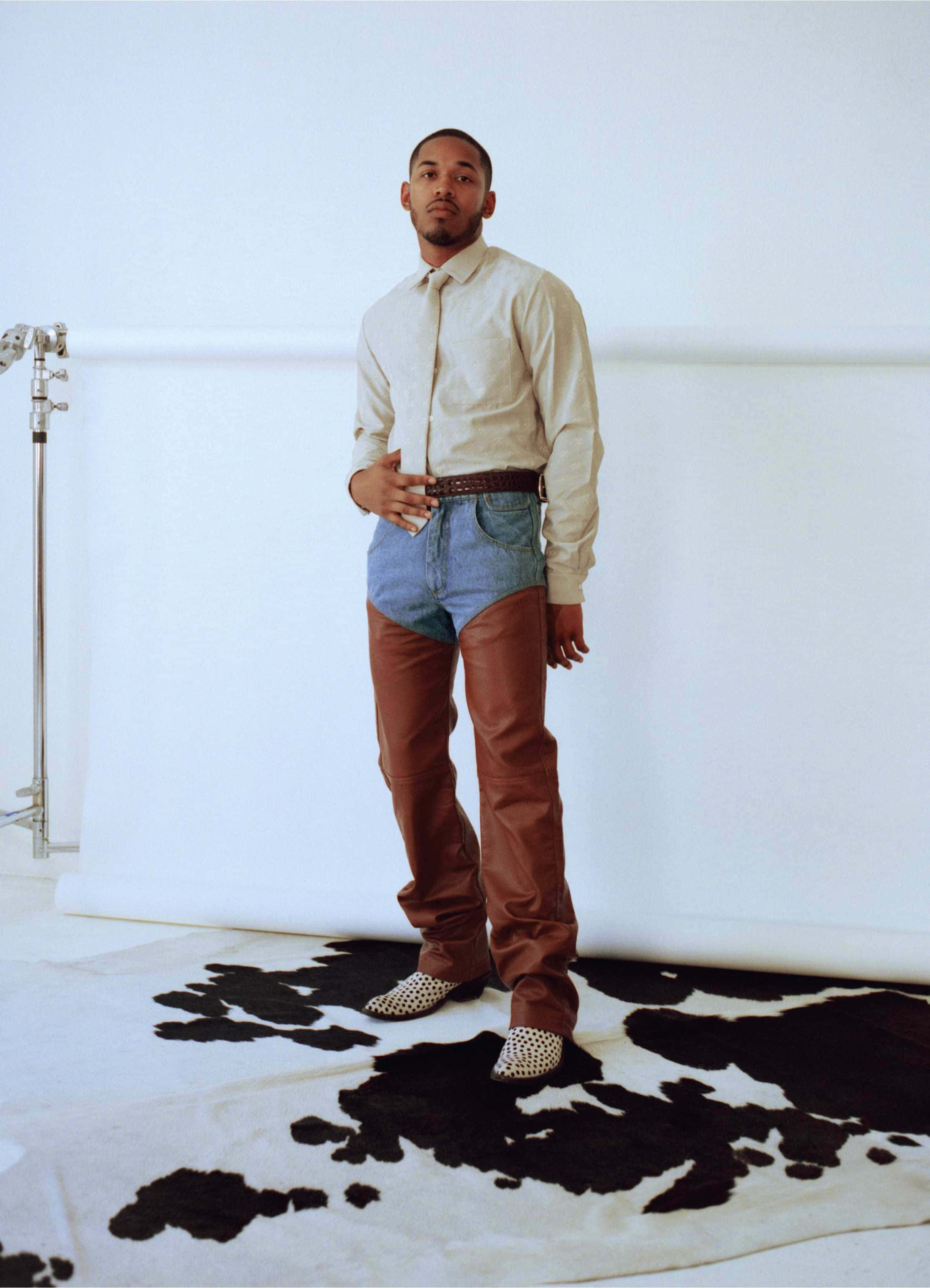 Kelvin Harrison Jr, beige shirt, brown leather pants, 2K Phone Wallpaper