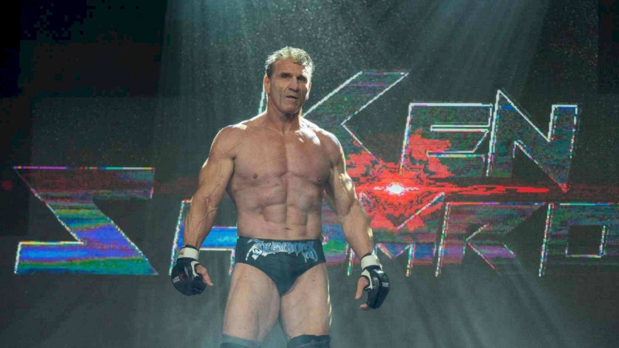 Ken Shamrock, stage lights, glitchy neon name backdrop, Full HD Desktop Wallpaper