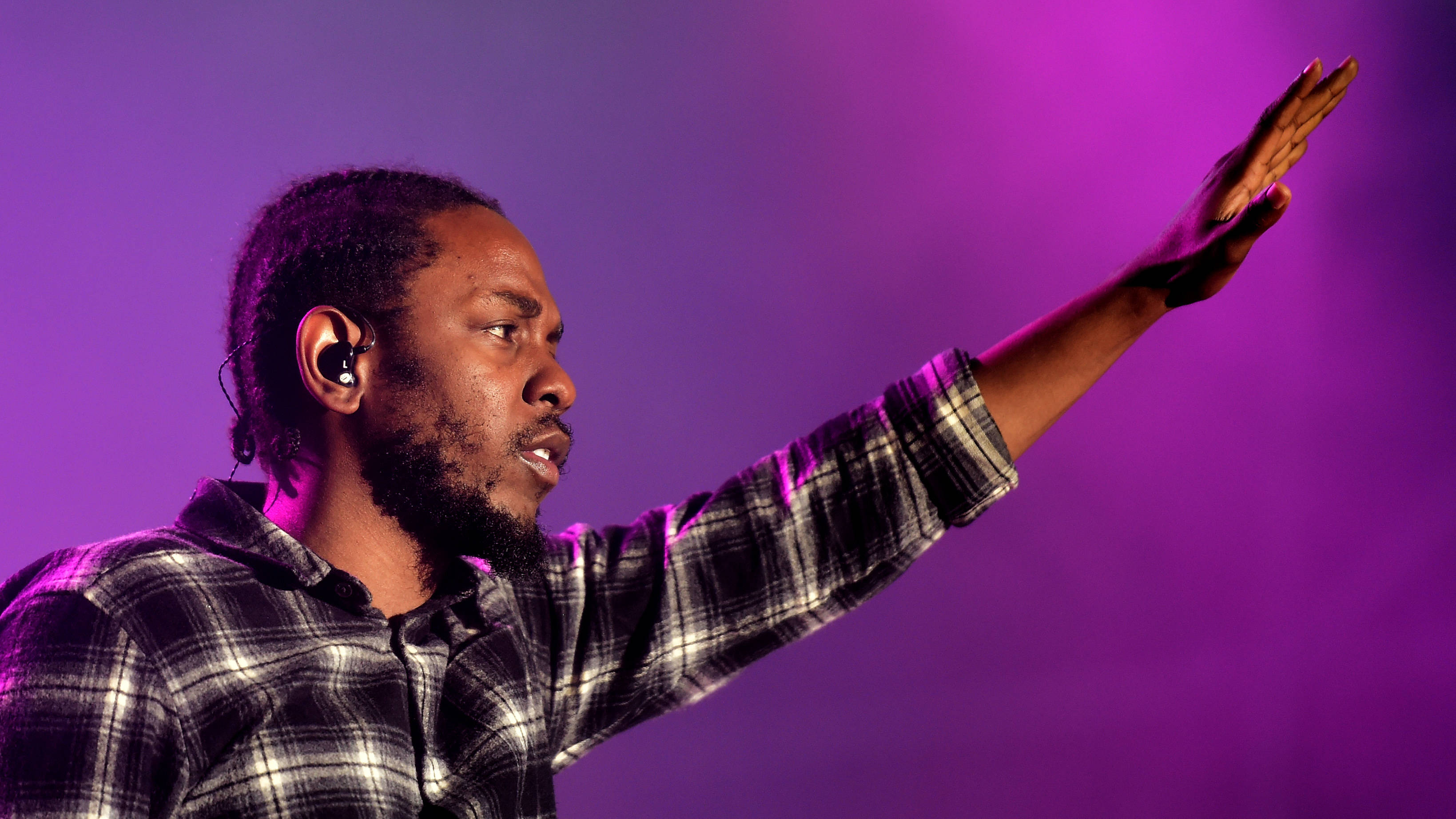 Kendrick Lamar, plaid shirt, vibrant purple stage lighting, 2K Desktop Wallpaper