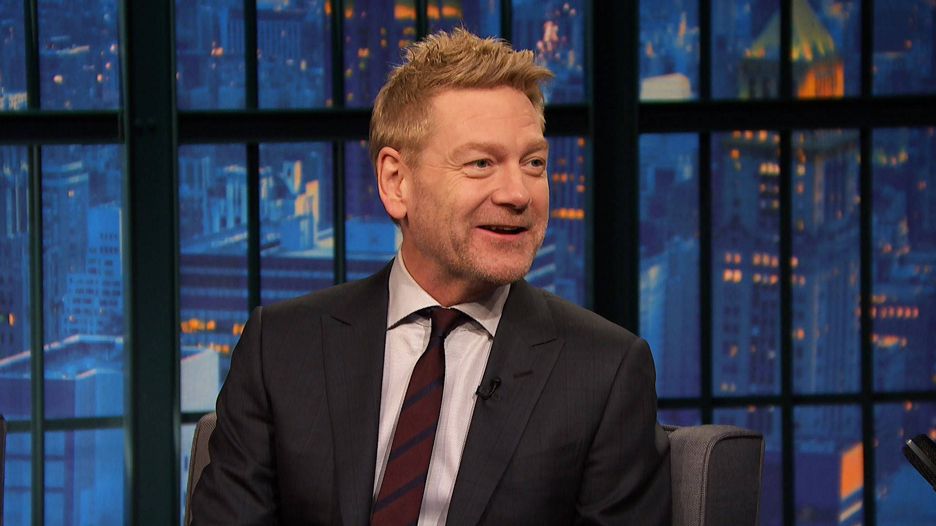 Kenneth Branagh, studio chair, nighttime cityscape, Full HD Desktop Wallpaper