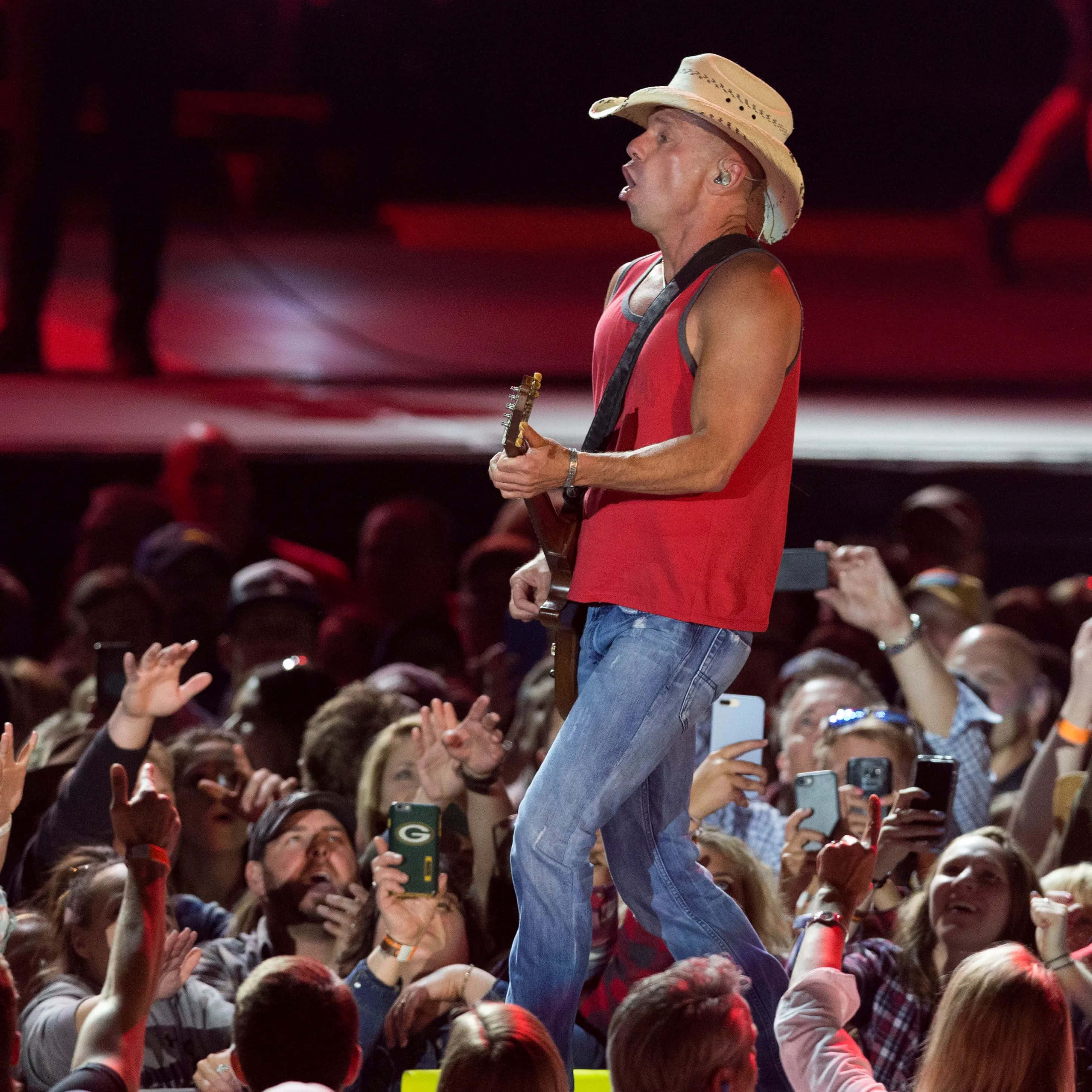 Kenny Chesney, red tank top, cowboy hat, 2K Desktop Wallpaper