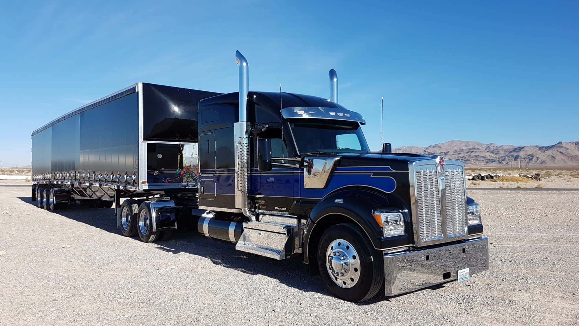 Kenworth W990, sleek black semi-truck, chrome accents, Full HD Desktop Wallpaper