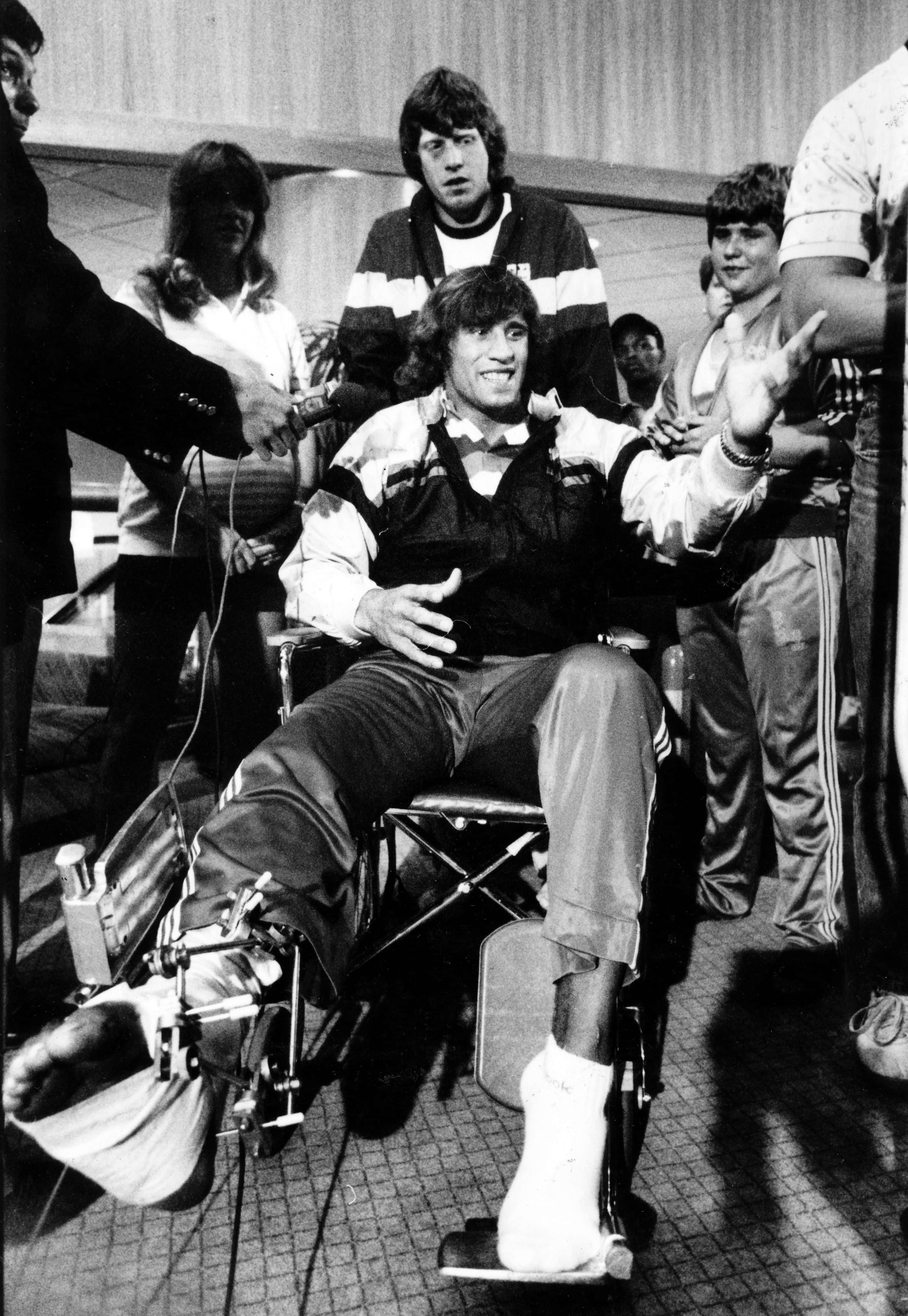 Kerry Von Erich, wheelchair, bandaged legs, 4K Phone Wallpaper