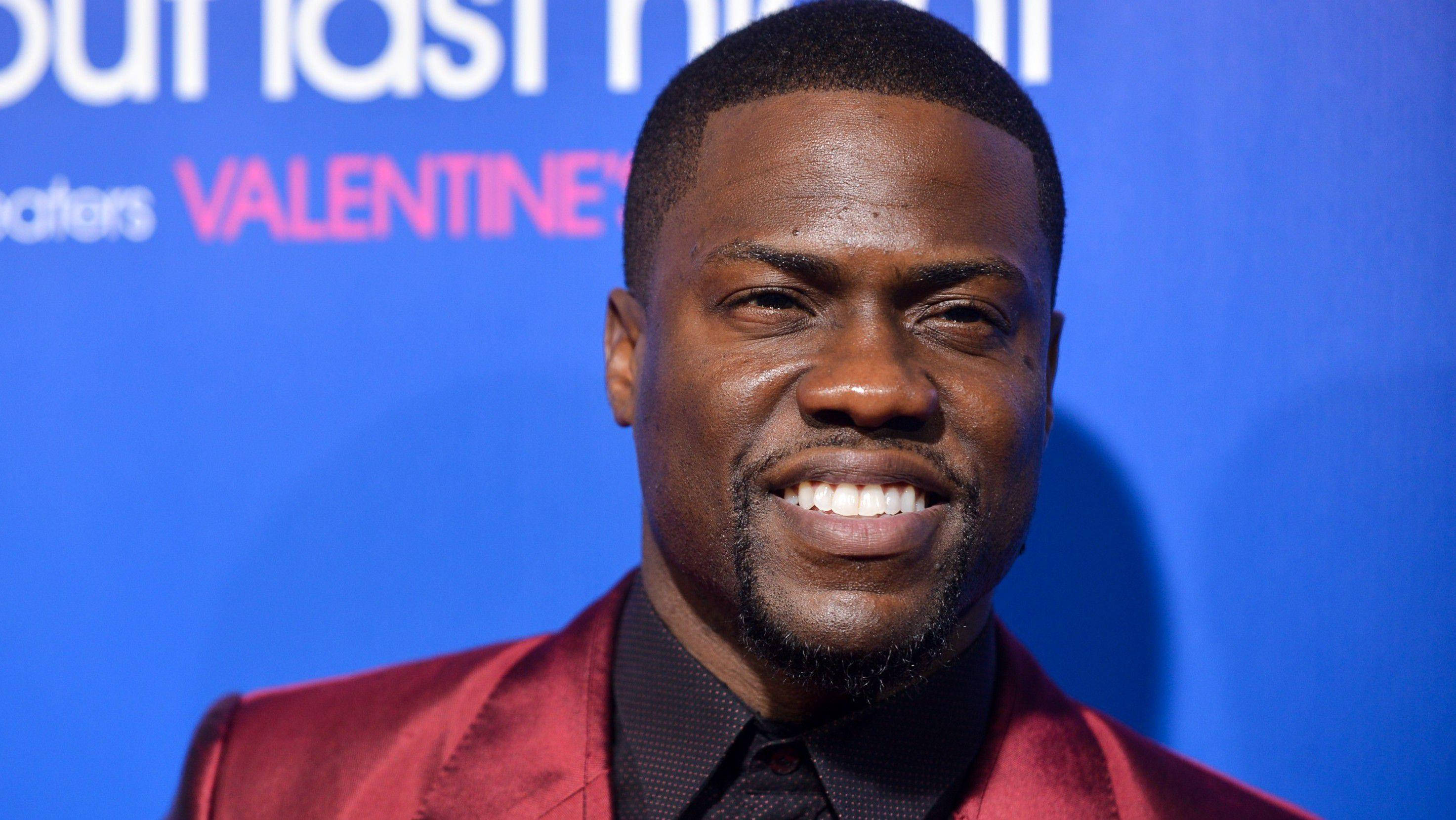 Kevin Hart, red satin suit, blue backdrop, 2K Desktop Wallpaper