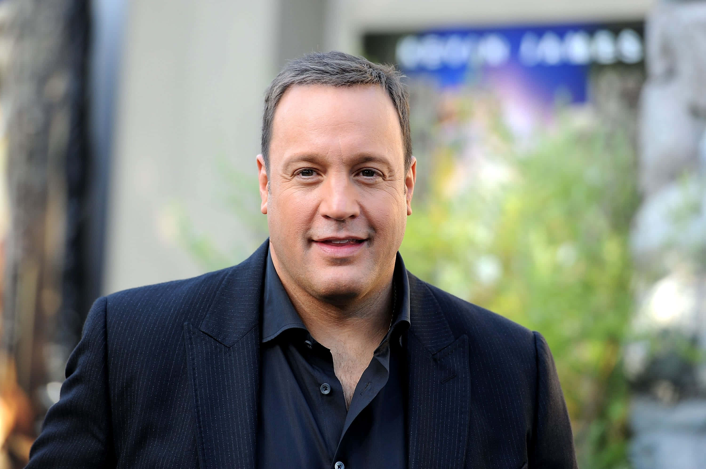 Kevin James, dark pinstripe suit, black shirt, 2K Desktop Wallpaper