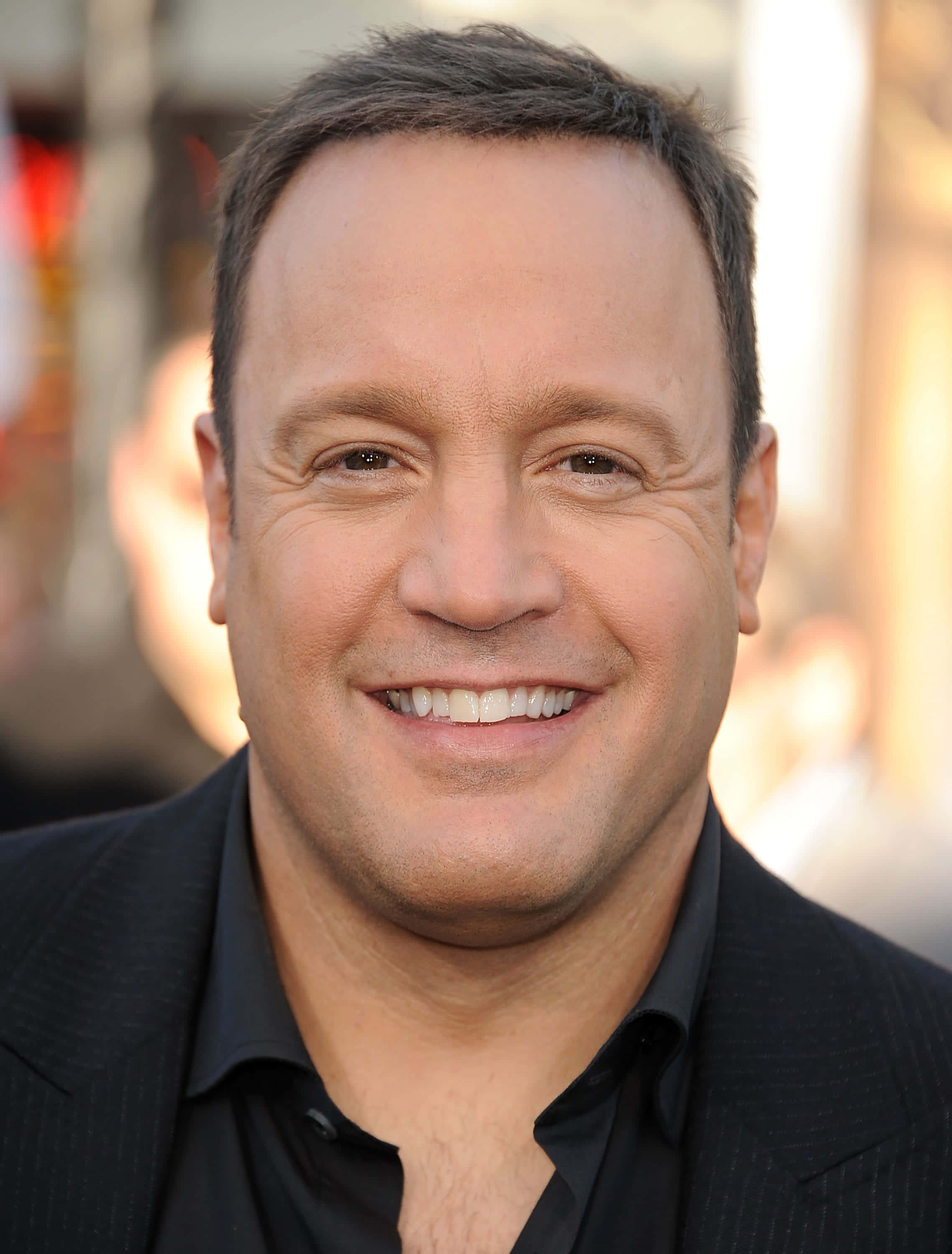 Kevin James, black suit, short dark hair, 2K Phone Wallpaper