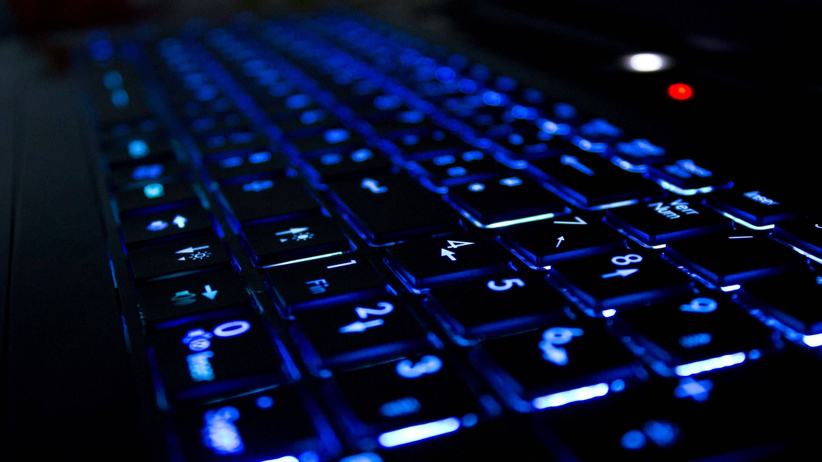blue backlighting, black keyboard, dark setting, 2K Desktop Wallpaper