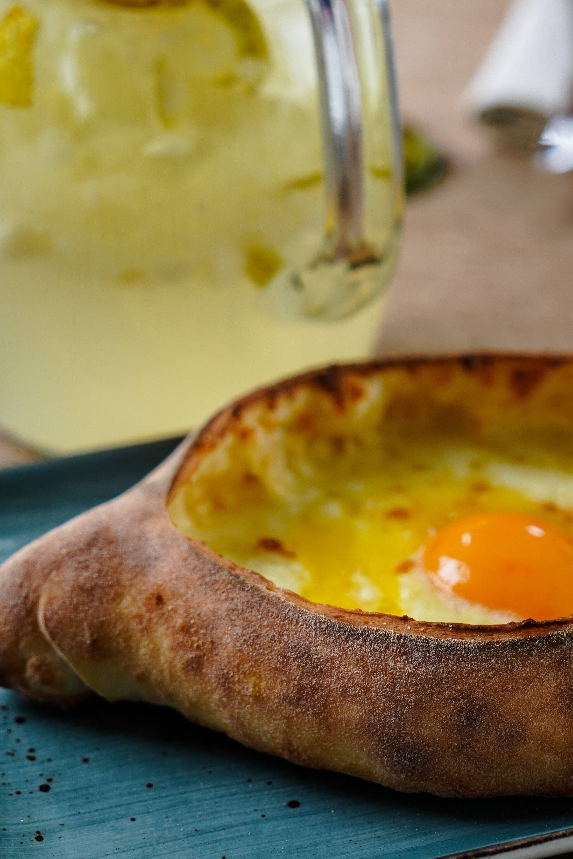 baked khachapuri, cheese and egg, crispy, charred bread bowl, 2K Phone Wallpaper