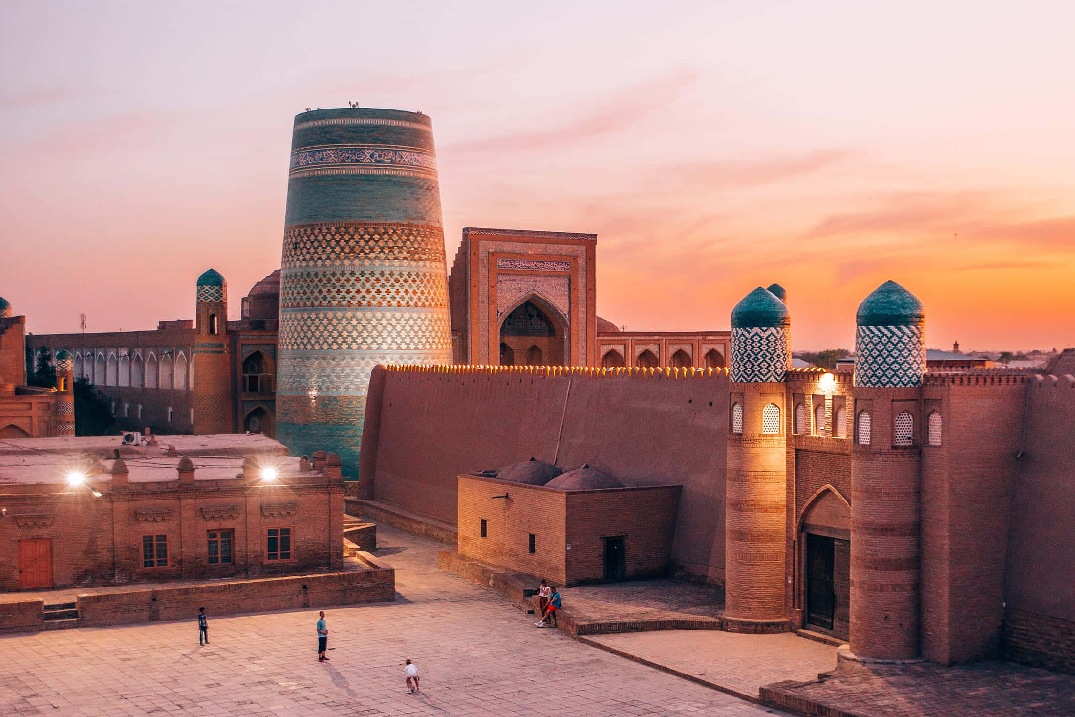 Khiva, turquoise tiled minarets, warm brick walls, Full HD Desktop Wallpaper