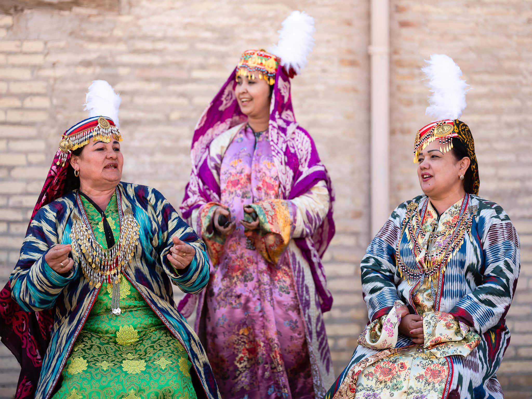 Khiva, traditional Uzbek attire, feathered headdresses, Full HD Desktop Wallpaper