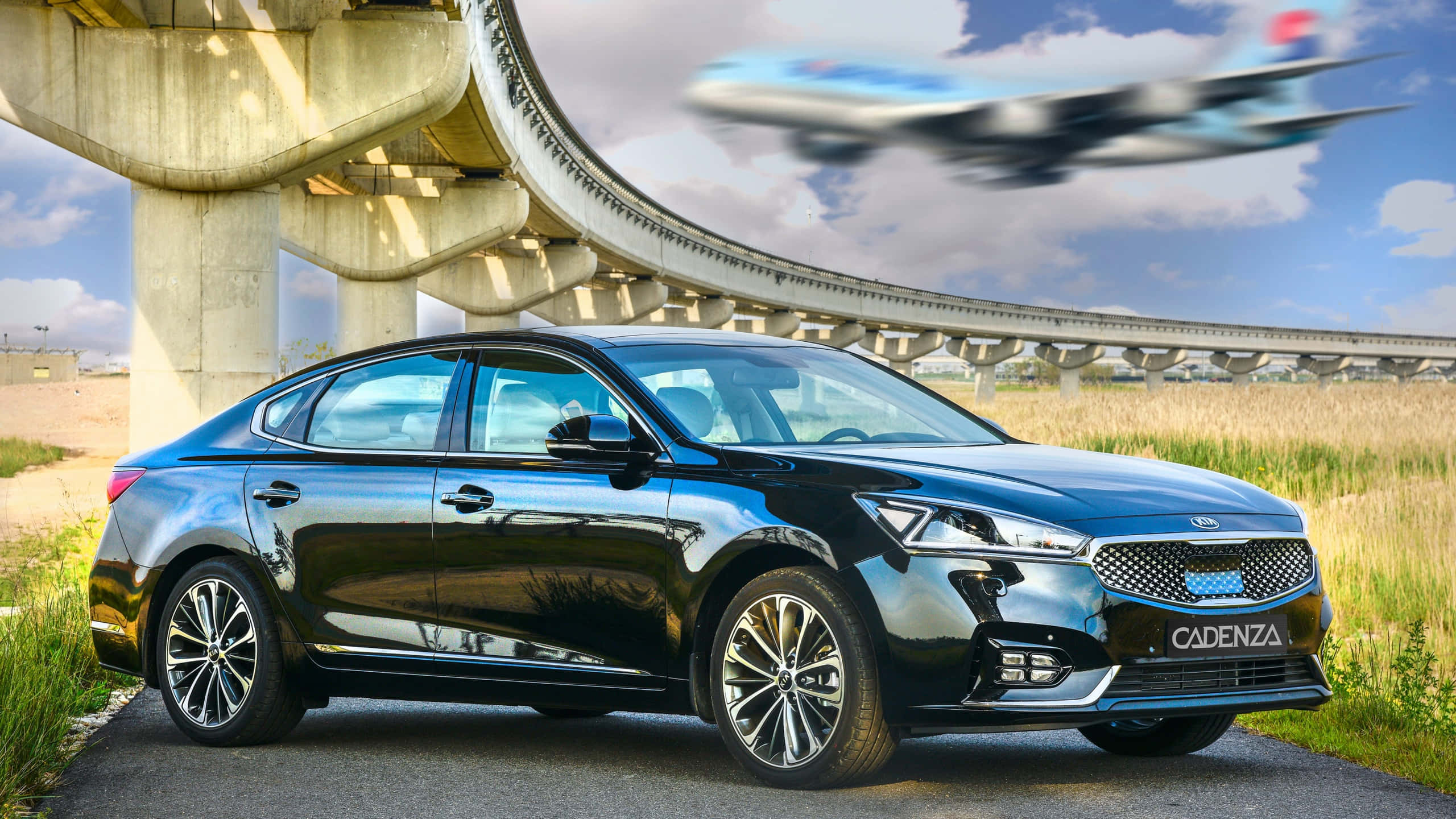 Kia Cadenza, sleek black, curved highway overpass, 2K Desktop Wallpaper