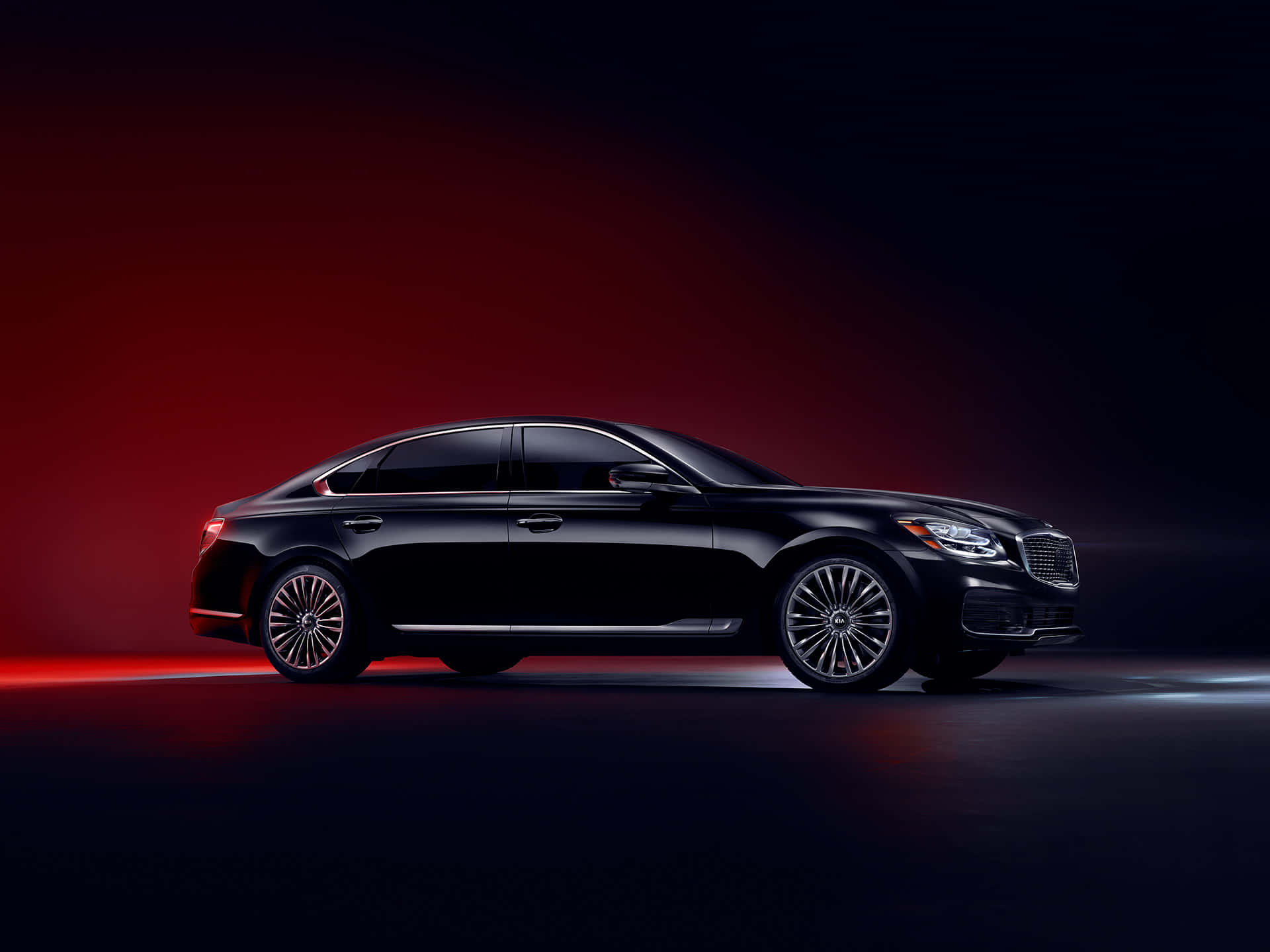 Kia K900, sleek black luxury sedan, dramatic red studio lighting, Full HD Desktop Wallpaper