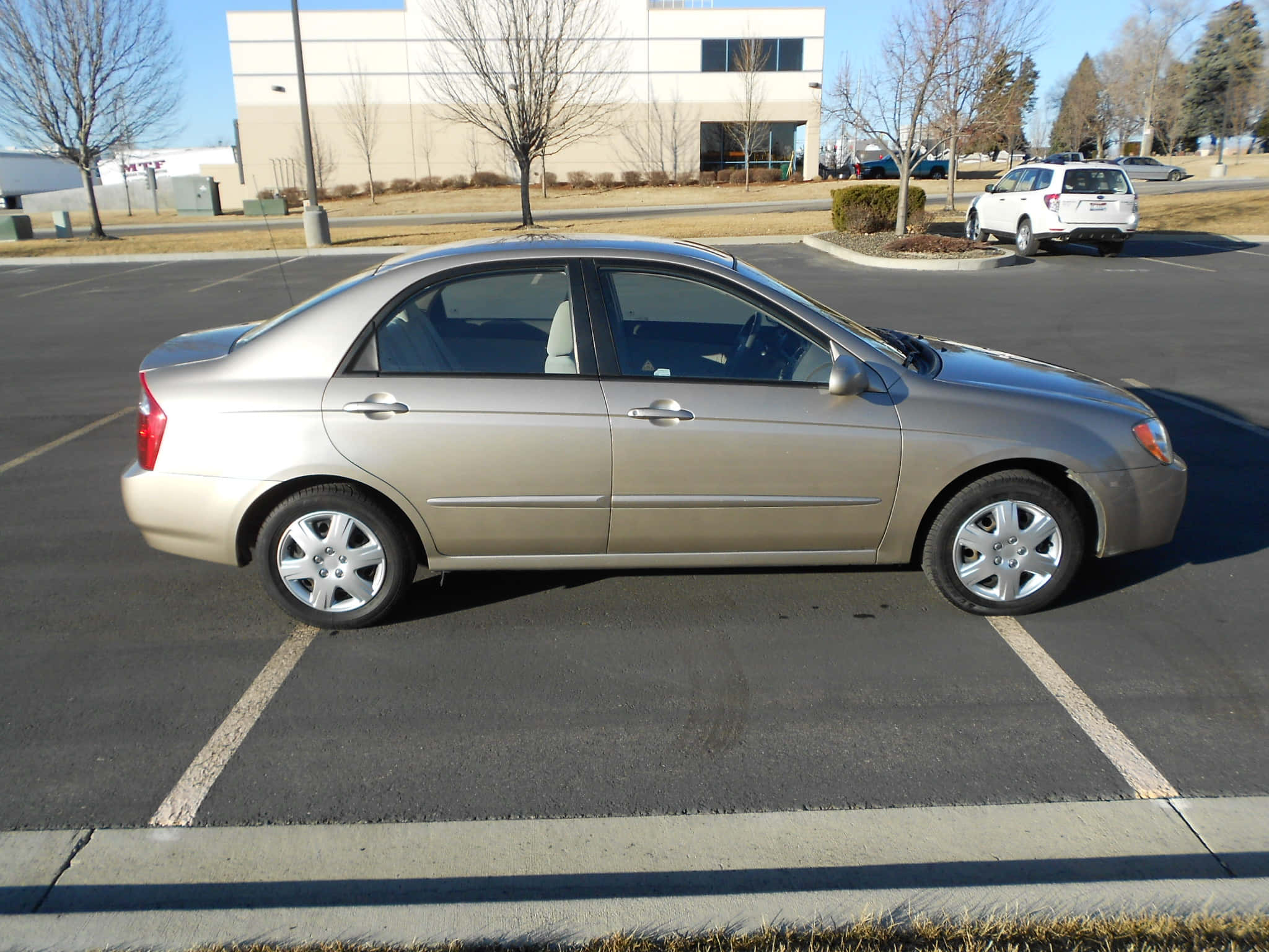 Kia Spectra, gold sedan, sunny parking lot, Full HD Desktop Wallpaper