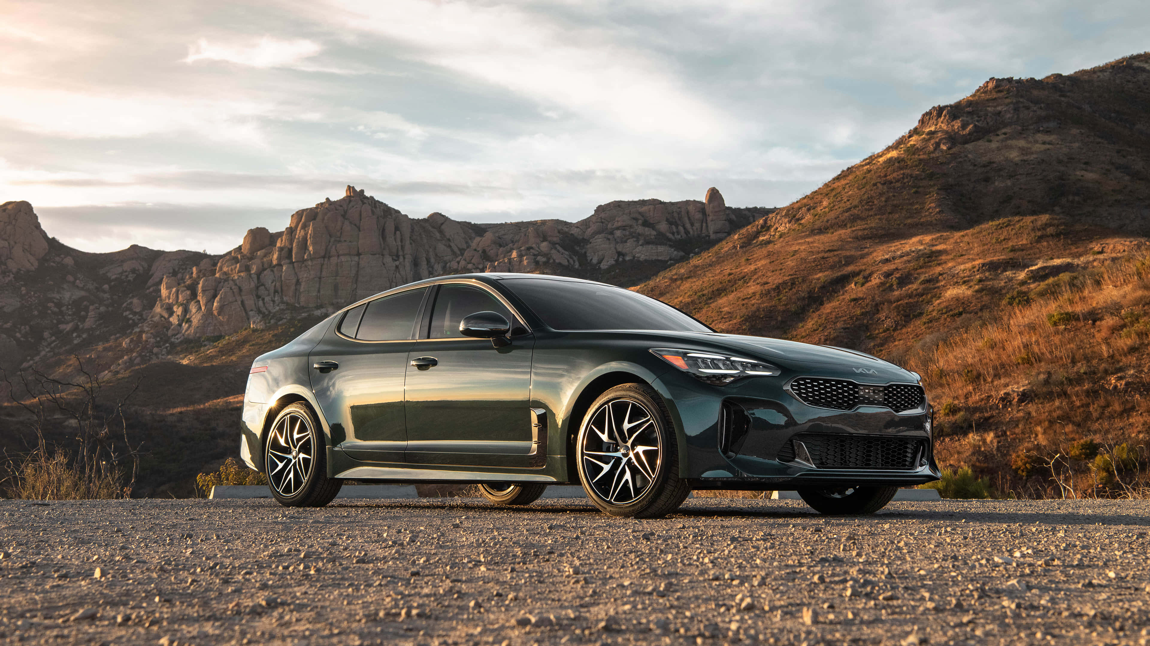 Kia Stinger, dark green, gravel road, 4K Desktop Wallpaper
