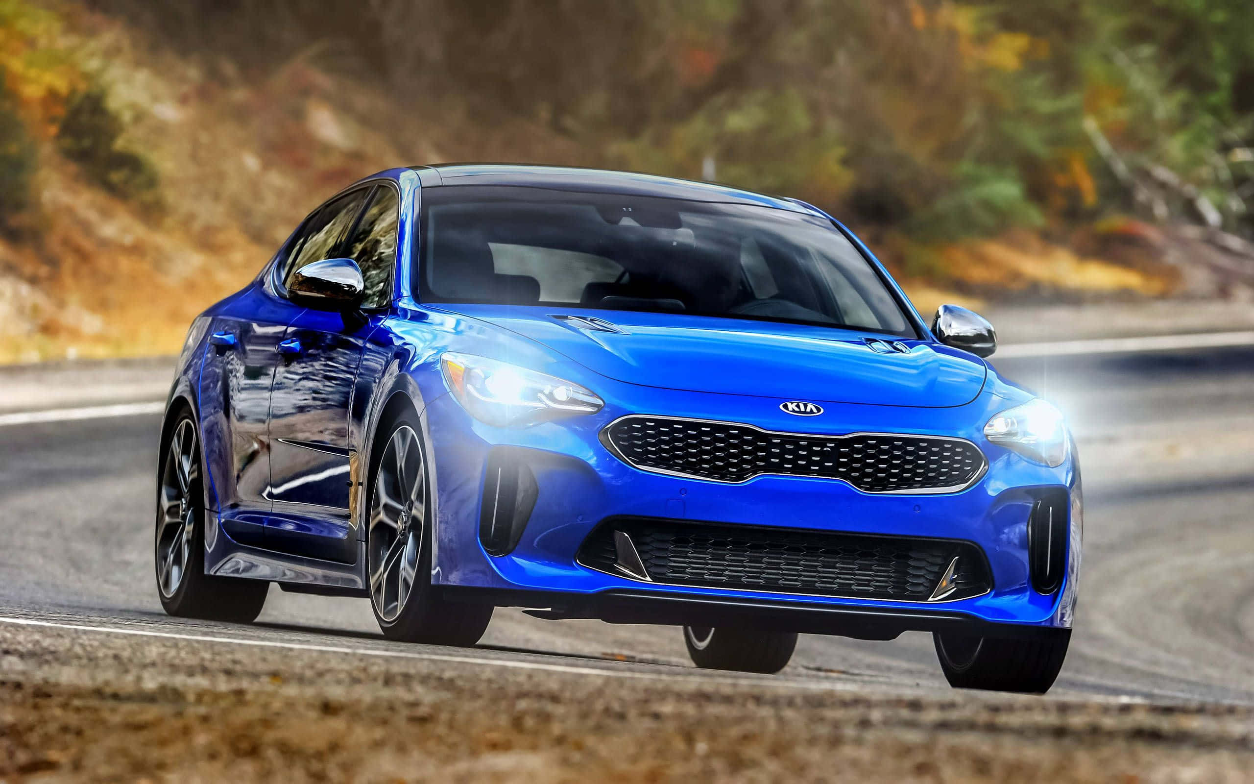 Kia Stinger, vibrant blue, winding mountain road, 2K Desktop Wallpaper