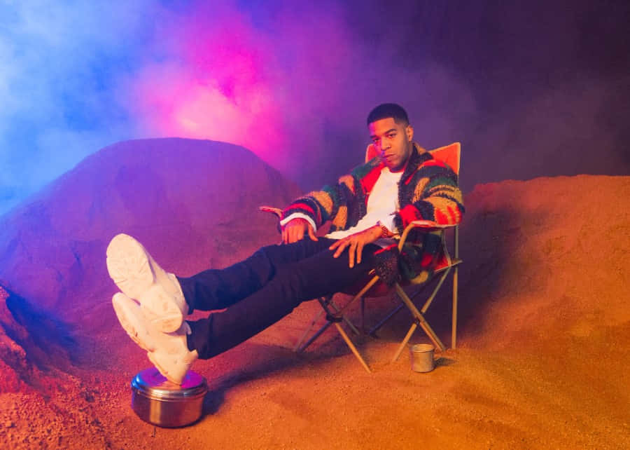 Kid Cudi, folding chair, surreal desert landscape, SD Desktop Wallpaper