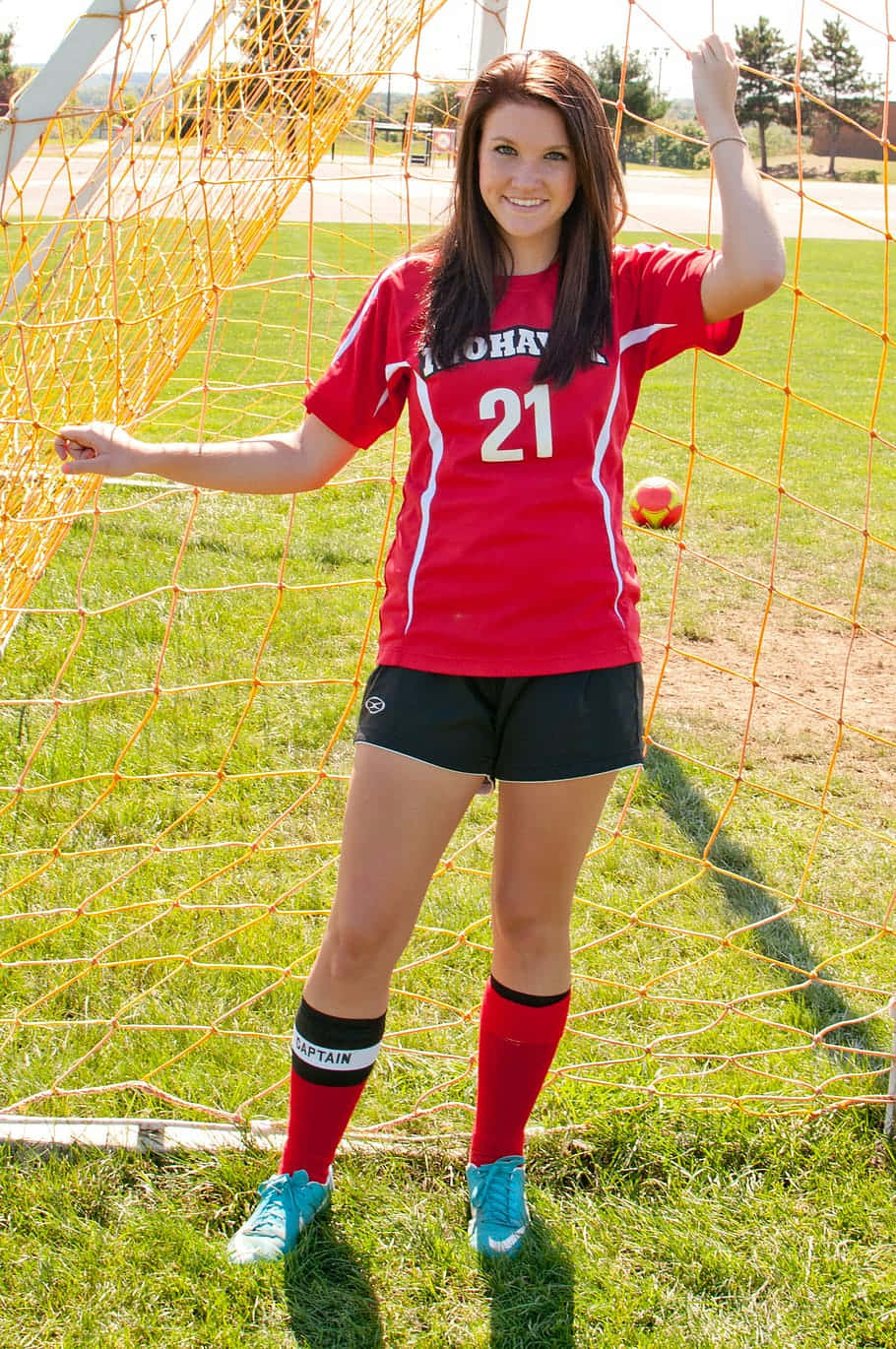 female soccer goalie, red jersey, captain socks, HD Phone Wallpaper