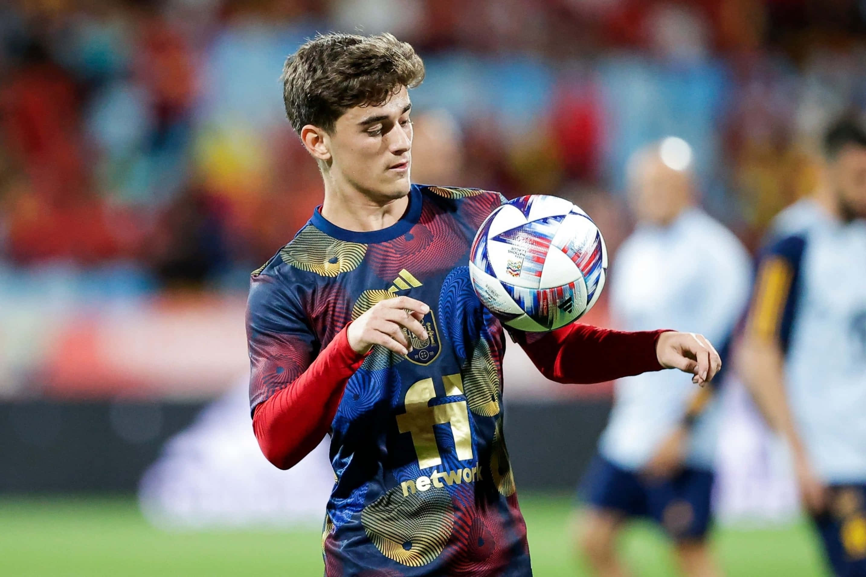 soccer player, blue and red patterned jersey, colorful match ball, 2K Desktop Wallpaper