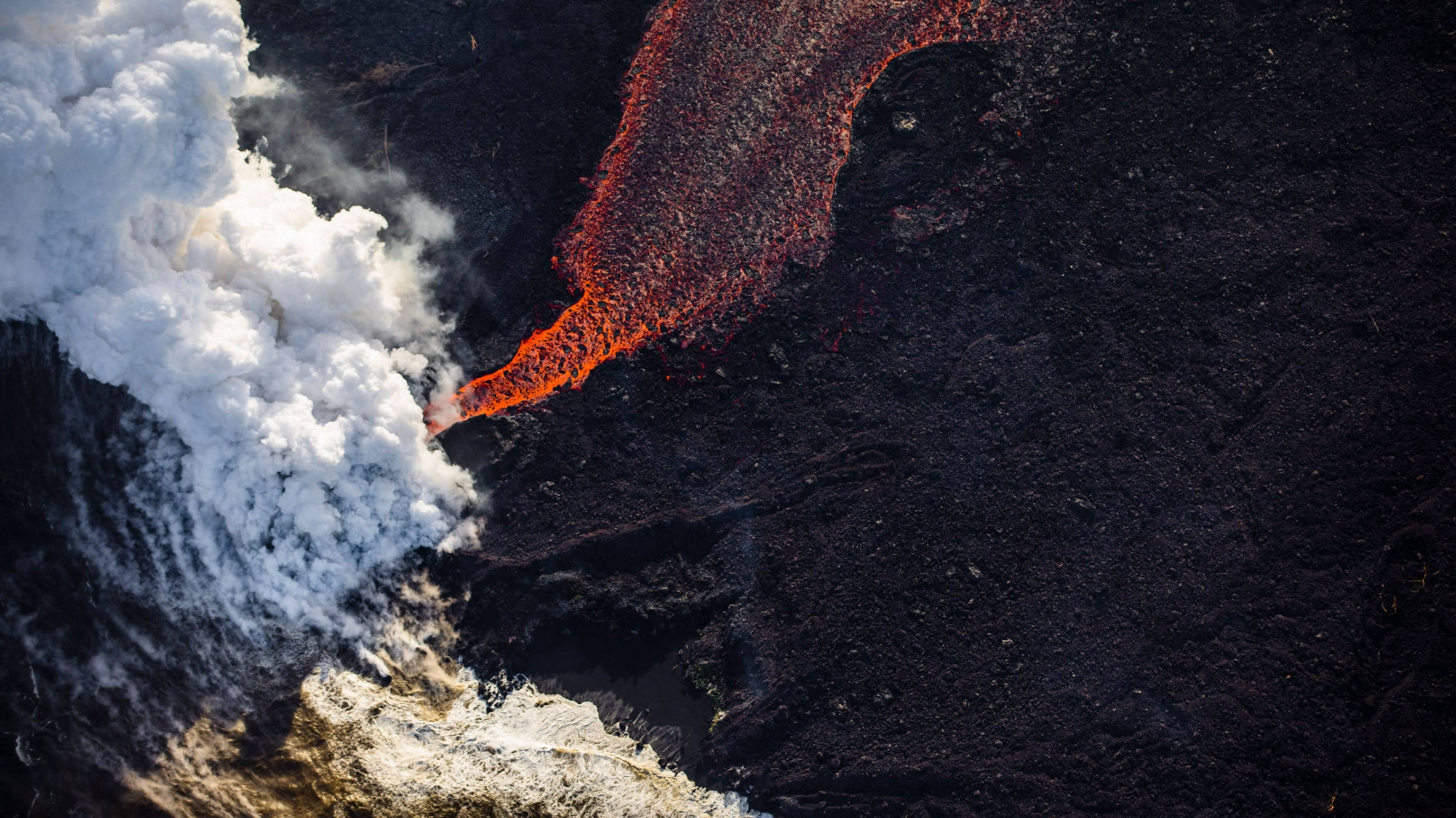 Kilauea Volcano, molten lava, dark volcanic terrain, 2K Desktop Wallpaper