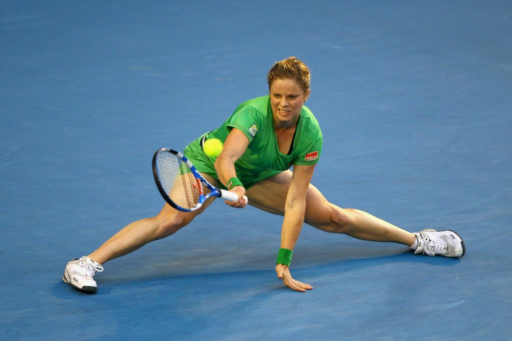 Kim Clijsters, green outfit, blue court, SD Desktop Wallpaper