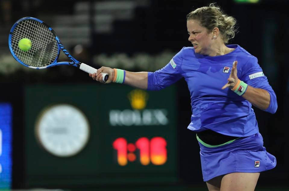 Kim Clijsters, blue outfit, yellow ball, SD Desktop Wallpaper