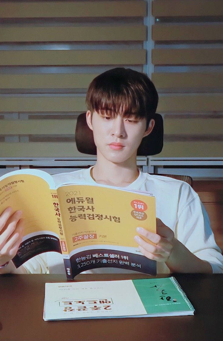 Kim Hanbin, white shirt, wooden desk, SD Phone Wallpaper