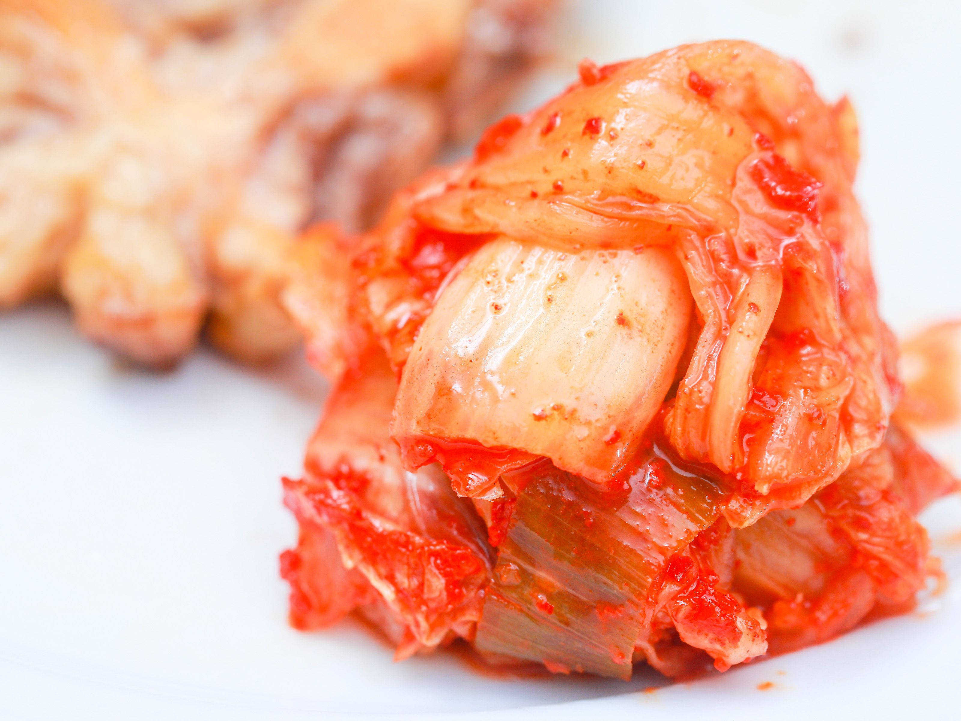 kimchi, vibrant red, translucent cabbage leaves, 2K Desktop Wallpaper