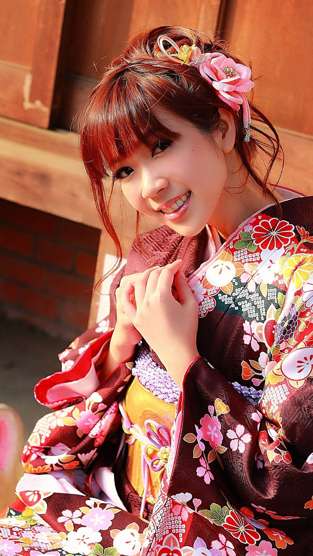vibrant floral kimono, pink hair accessory, wooden building backdrop, Full HD Phone Wallpaper