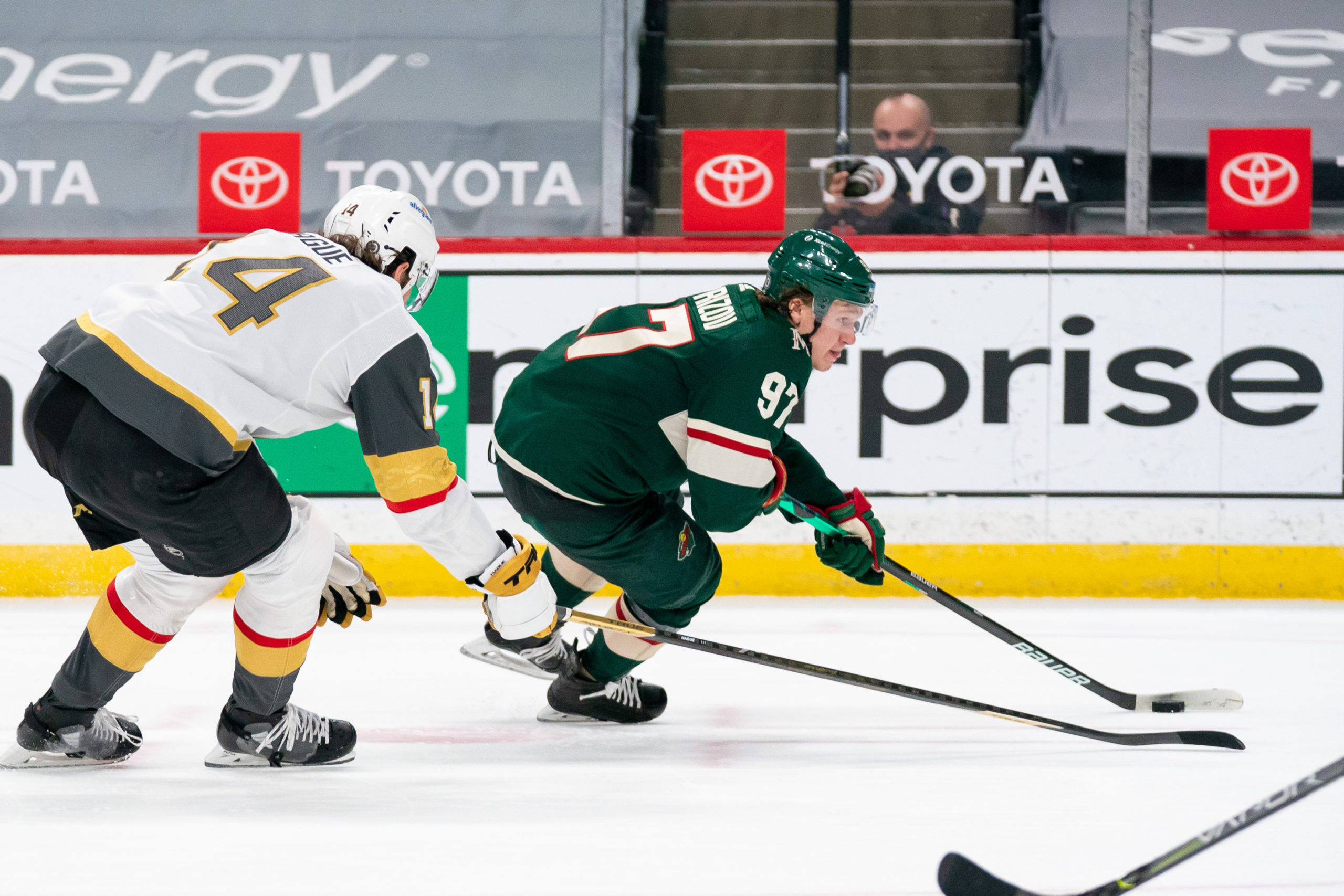 Kirill Kaprizov, green jersey number 97, white jersey number 4, 2K Desktop Wallpaper