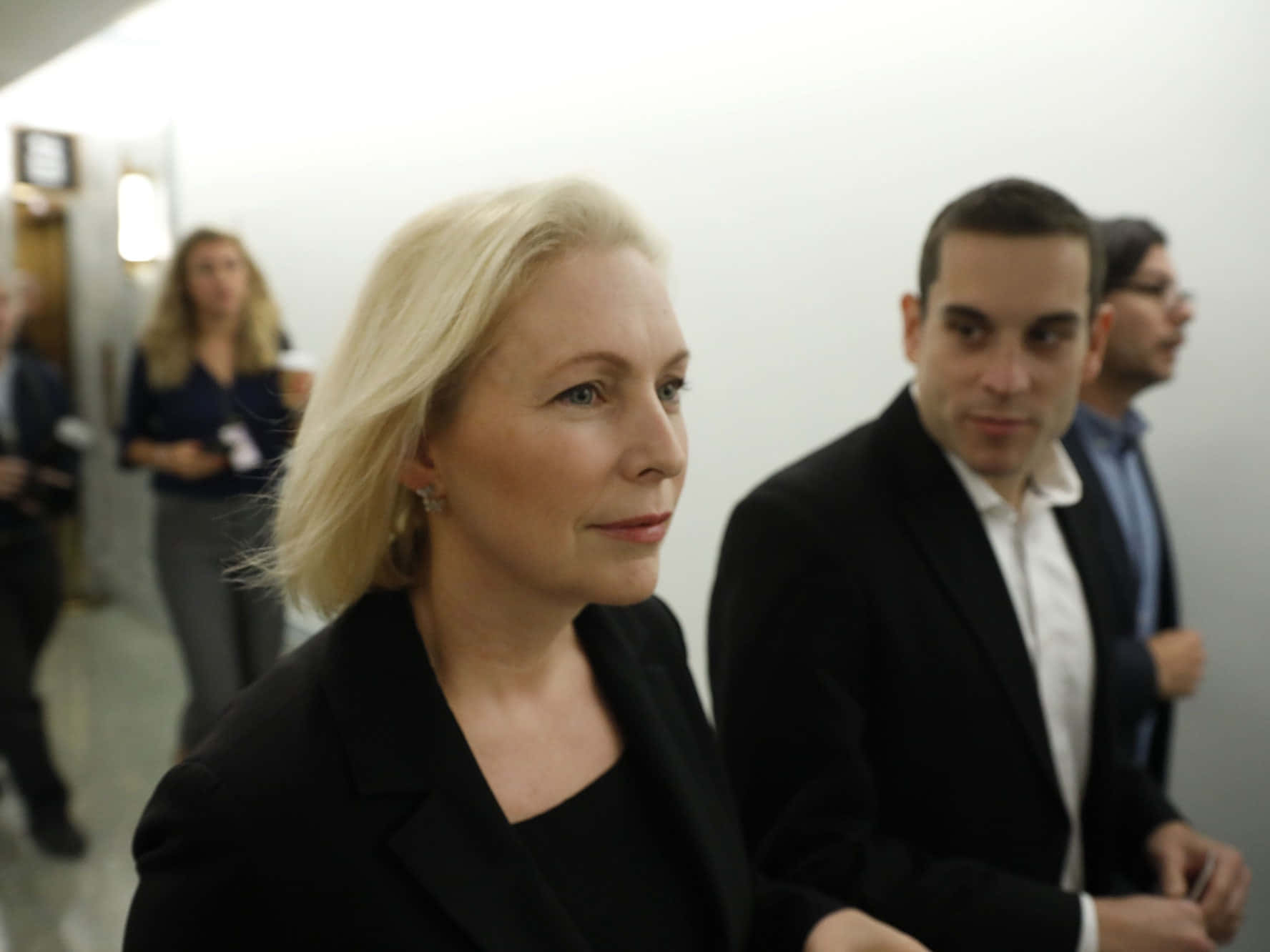 Kirsten Gillibrand, black blazer, bright hallway, HD Desktop Wallpaper