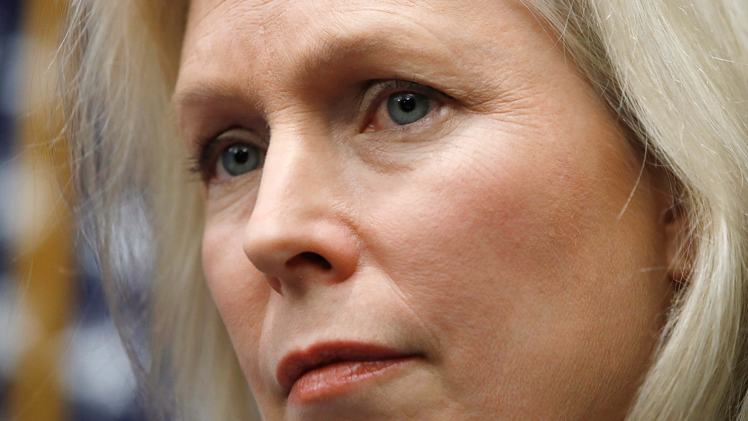 Kirsten Gillibrand, blonde hair, blue eyes, 2K Desktop Wallpaper
