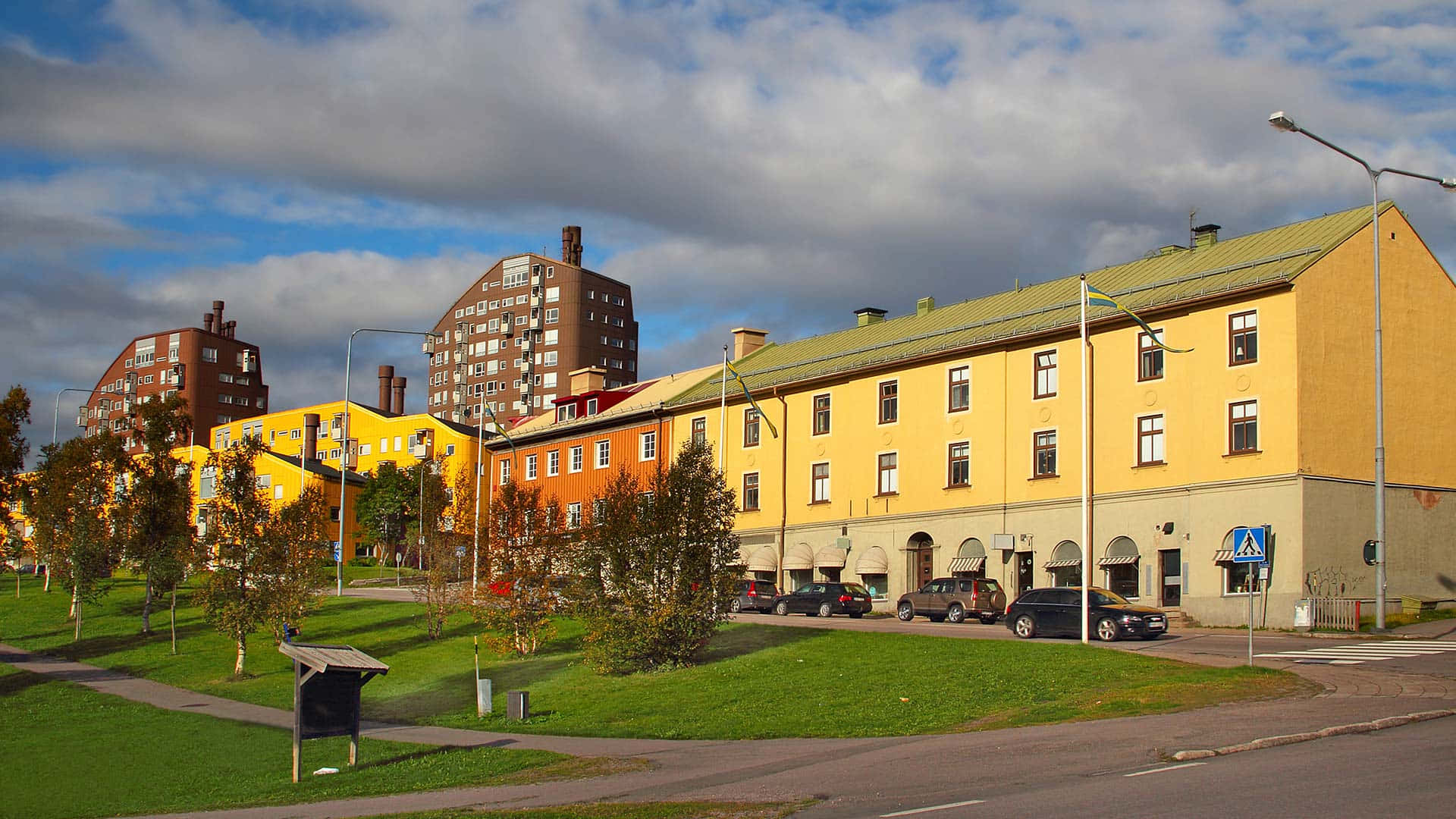 Kiruna, nighttime aurora, yellow and orange apartment buildings, Full HD Desktop Wallpaper