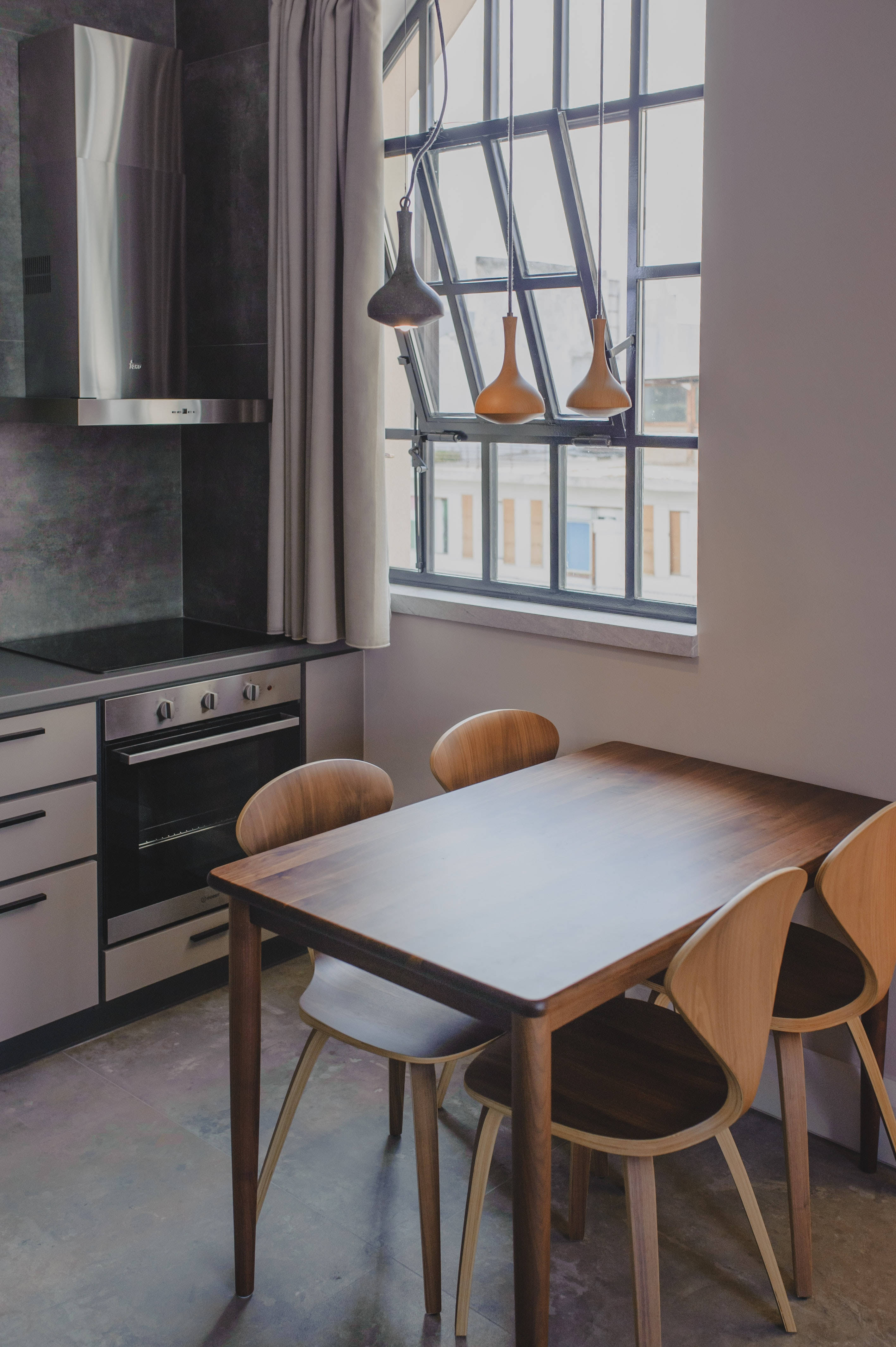 small kitchen, wooden dining table set, hanging pendant lights, 4K Phone Wallpaper