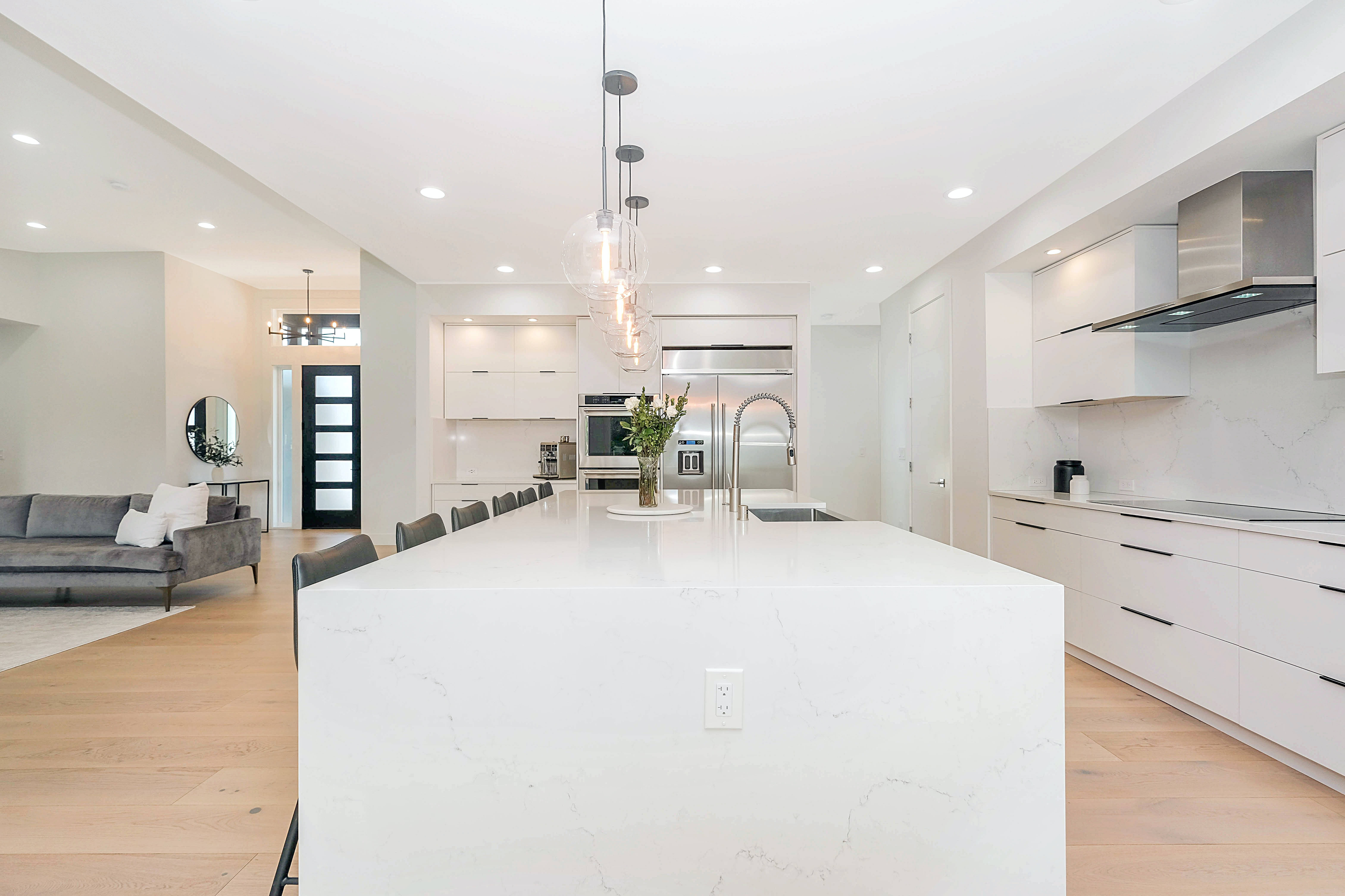 white marble countertops, light wood floors, gray sofa, 5K Desktop Wallpaper