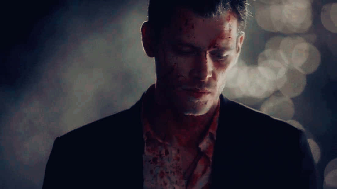 Klaus Mikaelson, bloody face, dimly lit scene, SD Desktop Wallpaper