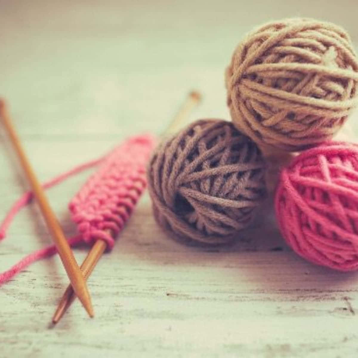 knitting yarns, wooden knitting needles, weathered white wooden surface, SD Desktop Wallpaper