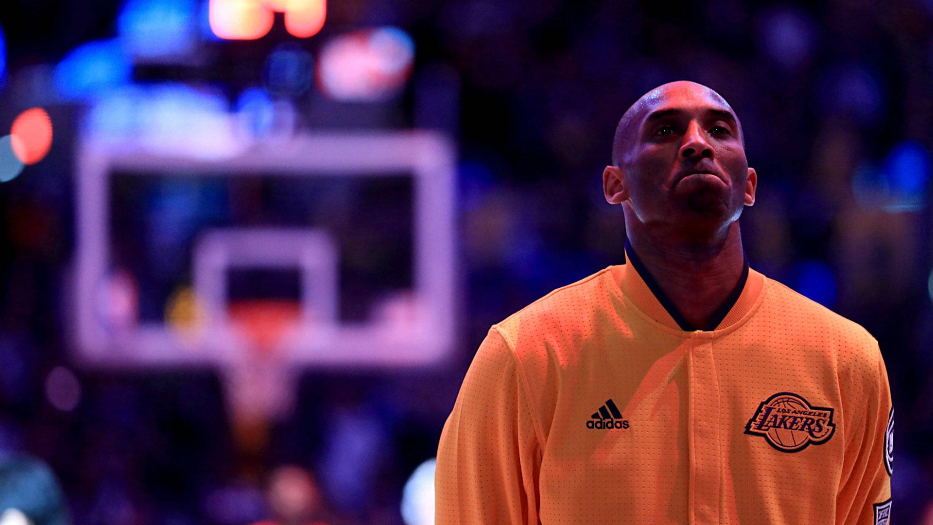 Kobe Bryant, orange Lakers warmup jacket, dimly lit basketball arena, Full HD Desktop Wallpaper